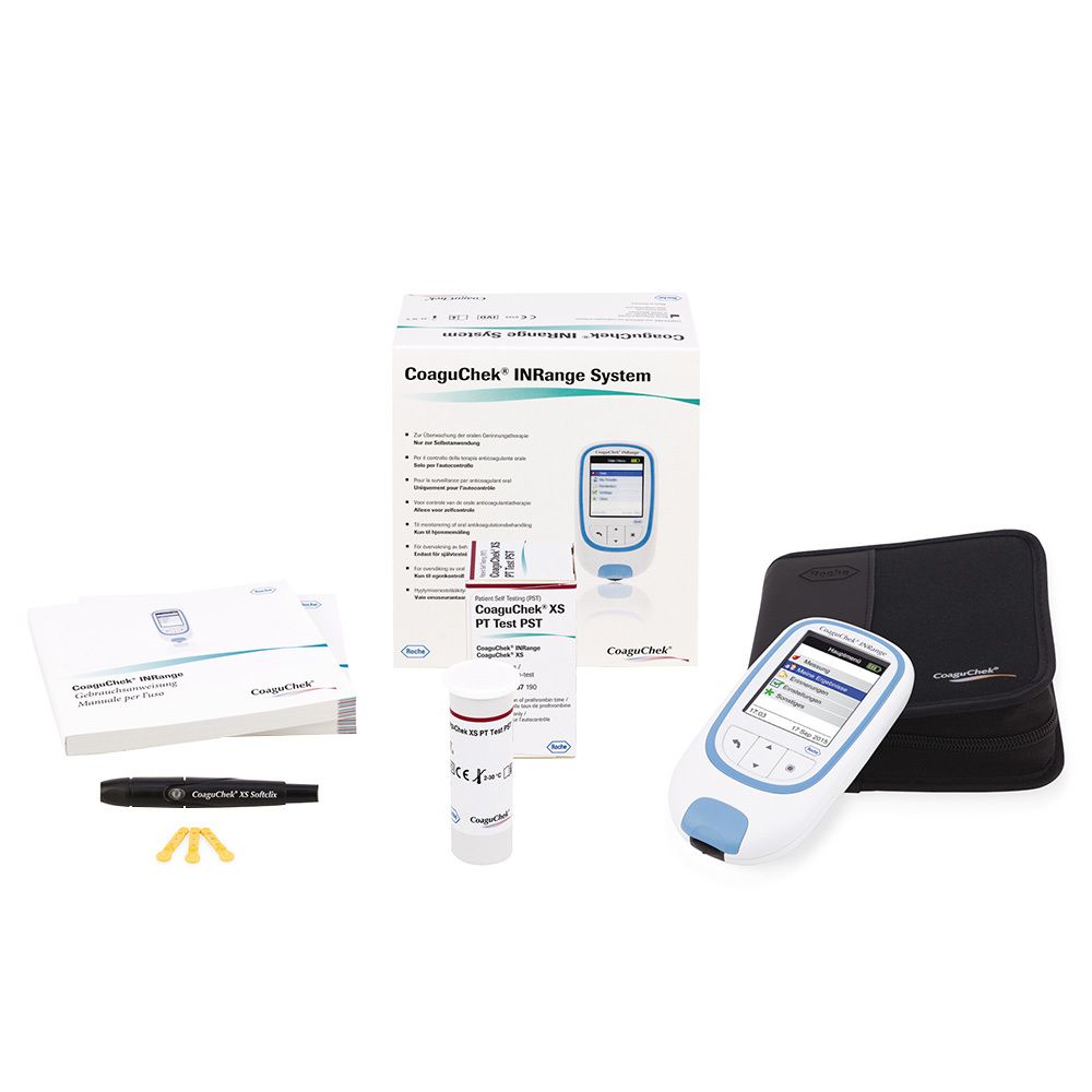 Emballage du système CoaguChek INRange avec appareil de mesure, bandelettes réactives et accessoires.