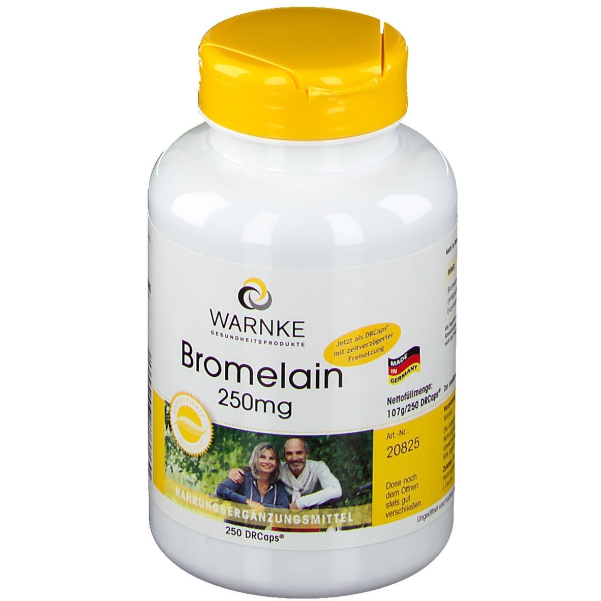 Flacon blanc à bouchon jaune. Inscription: Warnke Bromelain 250mg. Contient 250 DRcaps. Avec photo d'un couple.