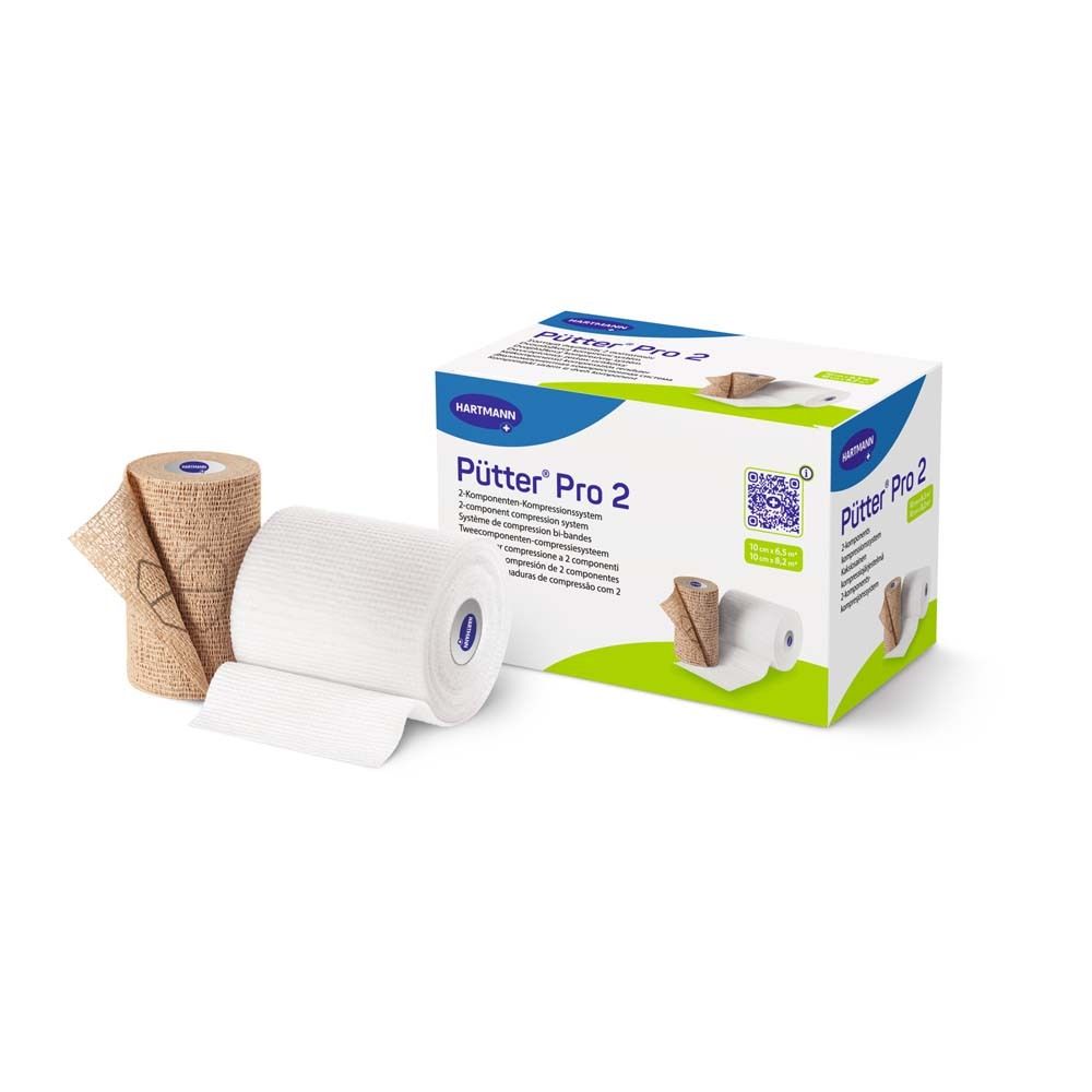 Twee compressieverbanden, beige en wit. Merk Hartmann. Beige verband gedeeltelijk afgerold.