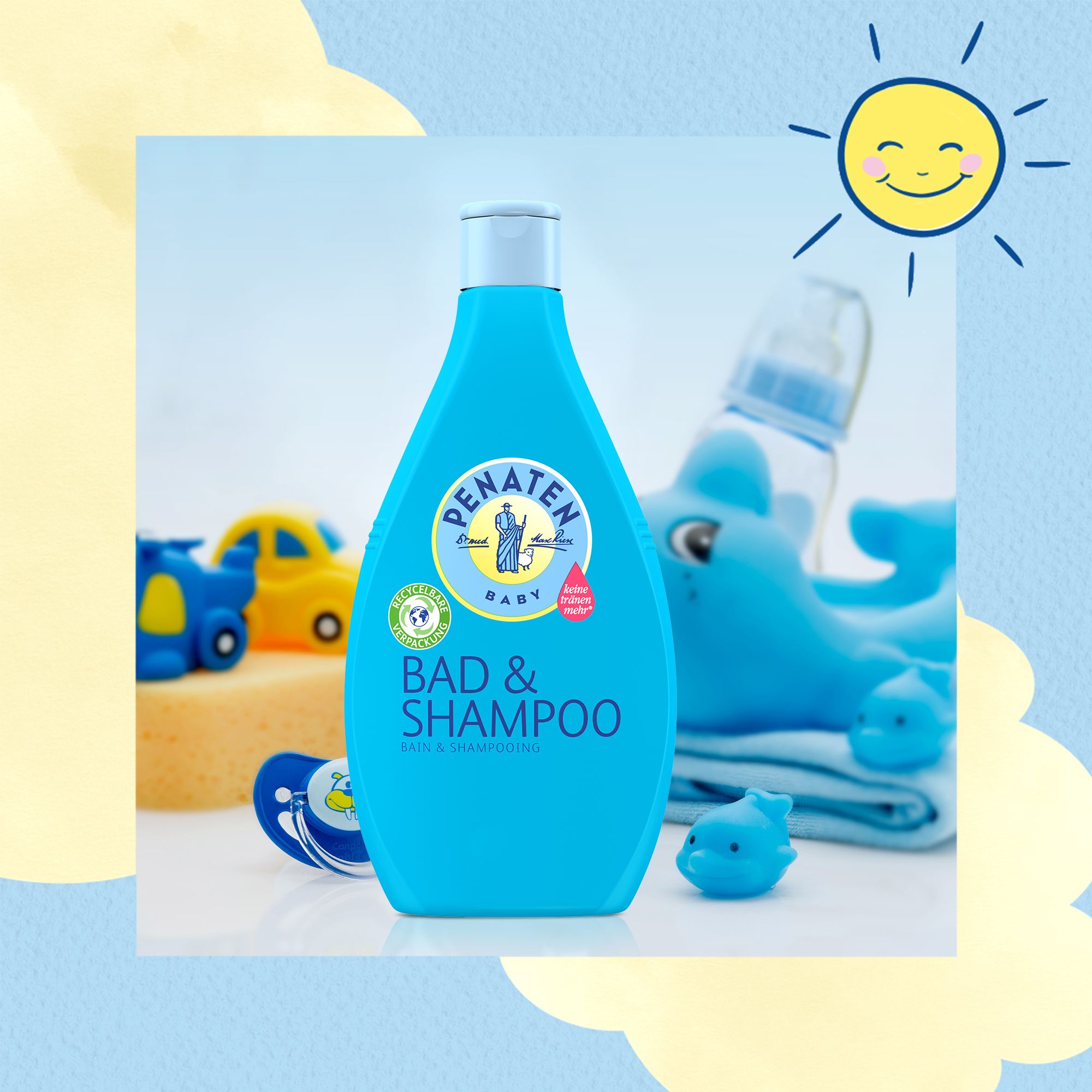 Flacon bleu clair PENATEN BABY Bain & Shampooing. Jouets et une sucette pour bébé en arrière-plan.