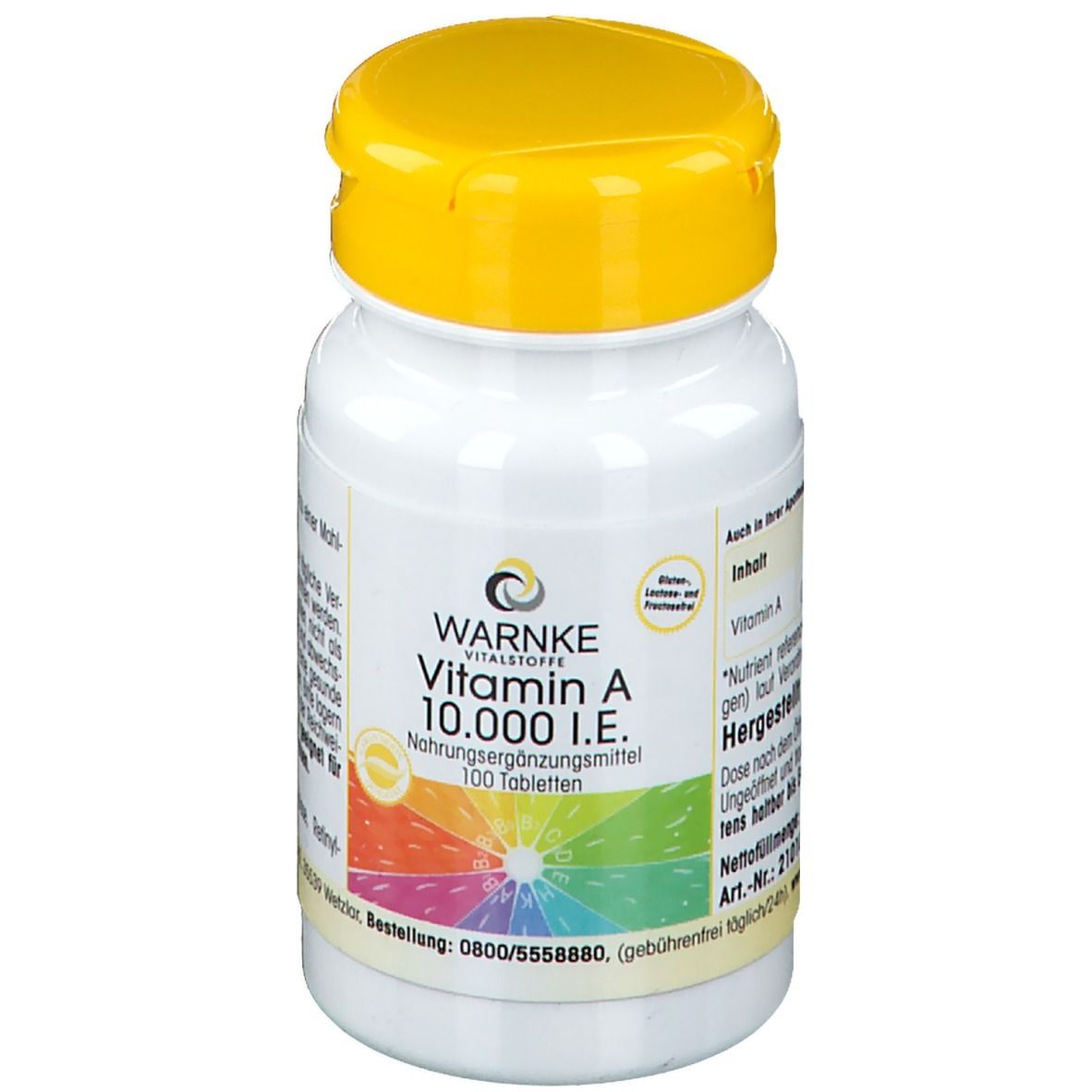Flacon blanc à bouchon jaune. Inscription: WARNKE, Vitamin A 10.000 I.E., 100 comprimés. Étiquette colorée.