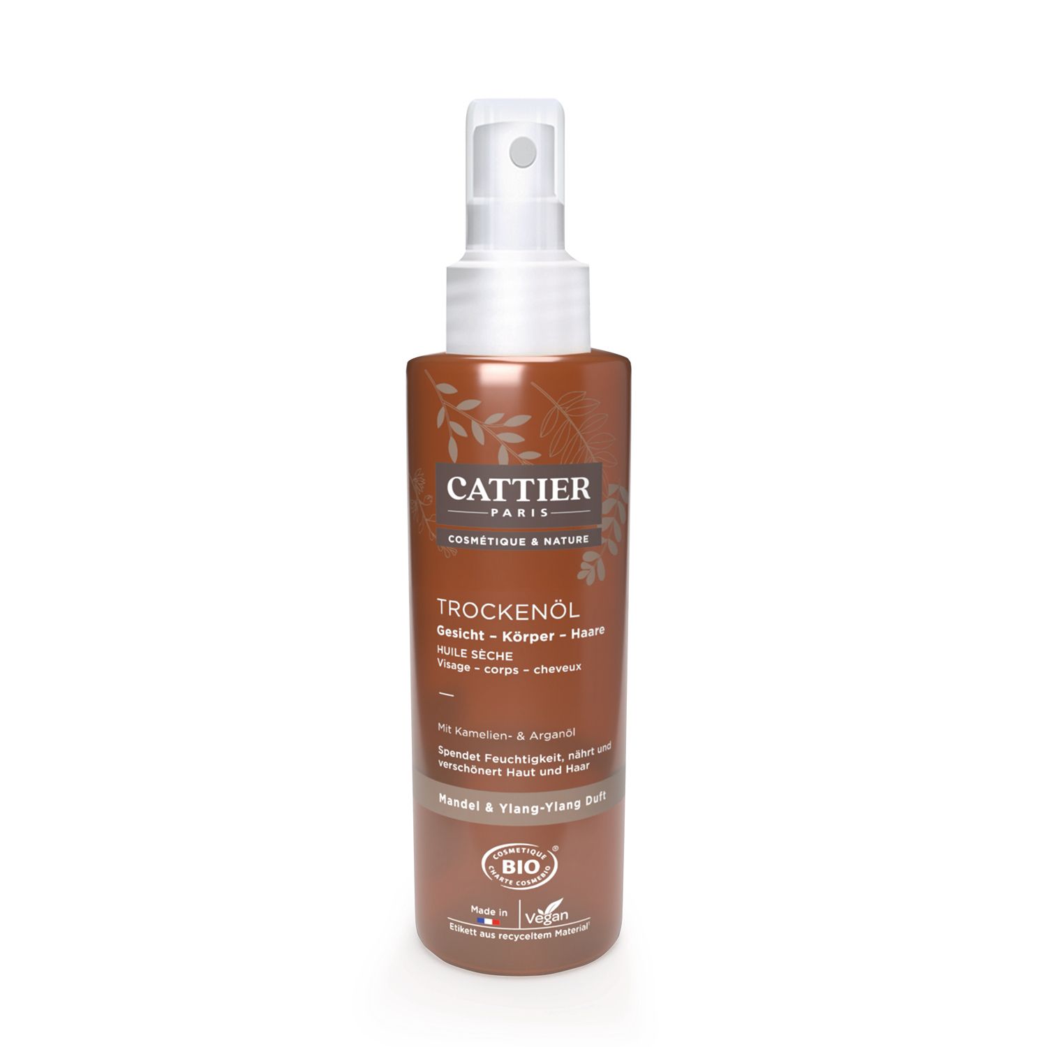 Bruine sprayfles met witte sproeikop. Opschrift: CATTIER, Droge olie, Kamelia & Argan. Bio-keurmerk.