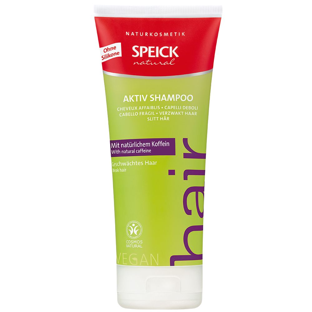 Groene tube met rode streep. Opschrift: SPEICK natural, Aktiv Shampoo, met natuurlijke cafeïne. Vegan-zegel.