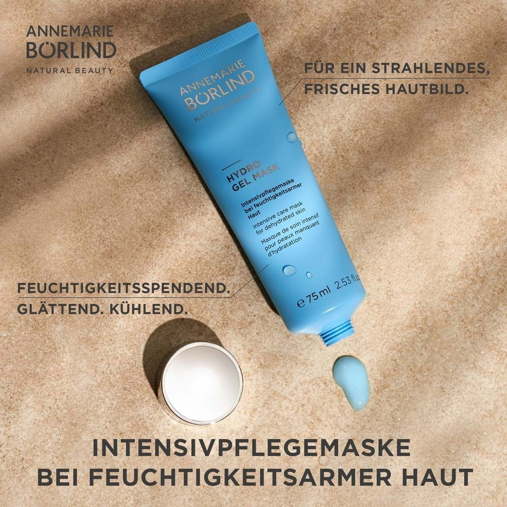 Tube bleu clair avec bouchon argenté. Inscription: ANNEMARIE BÖRLIND, HYDRO GEL MASK. À côté, un bouchon ouvert et du gel.