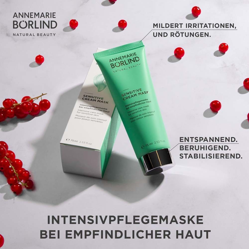 Produit et emballage. Baies rouges. Texte: Masque de soin intensif pour peaux sensibles. Texte en allemand.