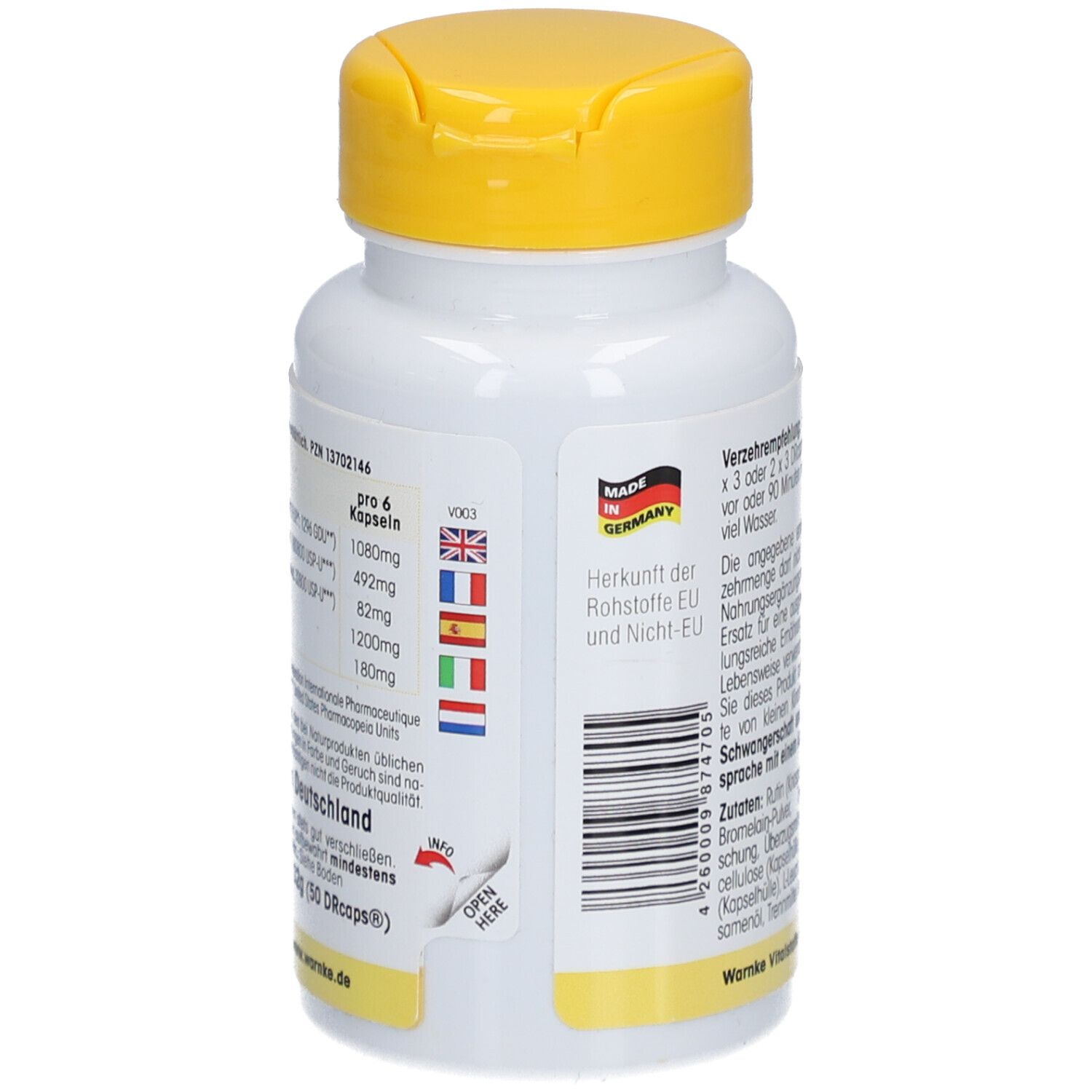 Achterkant van de witte fles met gele dop. Tekst en vlaggen. Gemaakt in Duitsland.