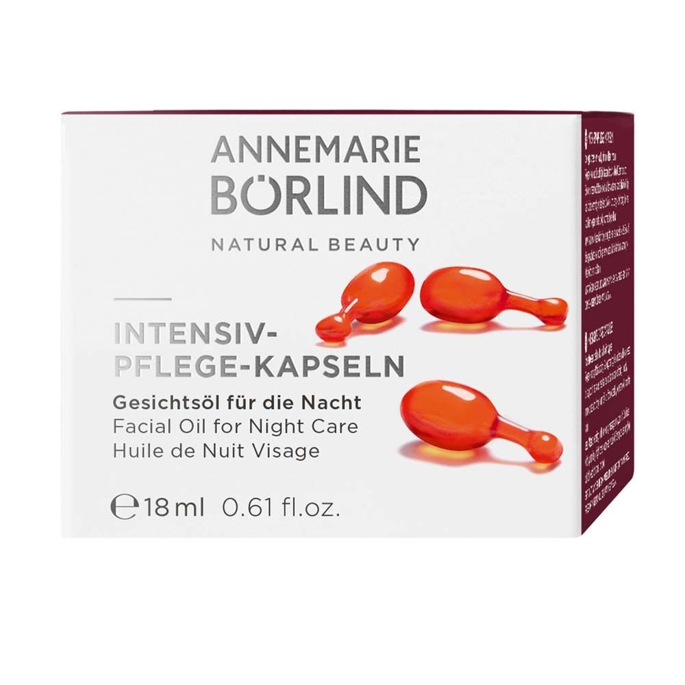 Verpakking met capsules. Opschrift: INTENSIV-PFLEGE-KAPSELN. Gezichtsolie voor de nacht. 18 ml.