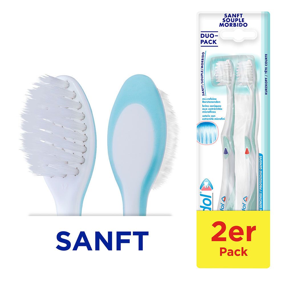 Twee tandenborstels, witte borstelkop, lichtblauwe handgreep. Duo-Pack verpakking. Opschrift: ZACHT, 2 stuks.