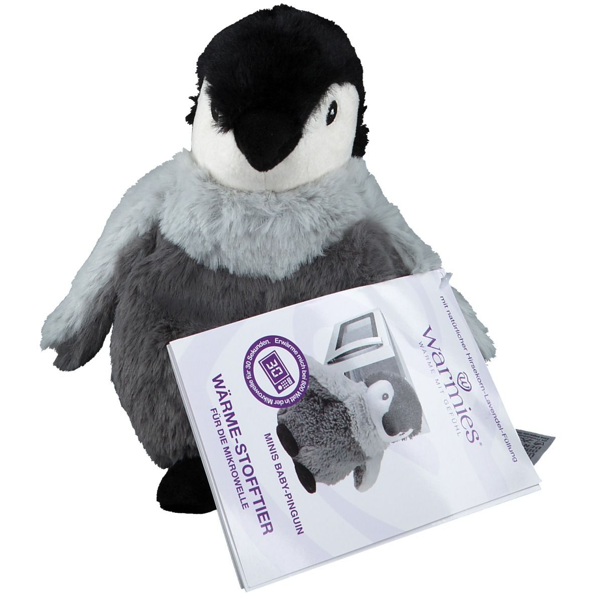 Peluche pingouin gris et noir avec étiquette. Étiquette avec nom du produit et symbole micro-ondes.