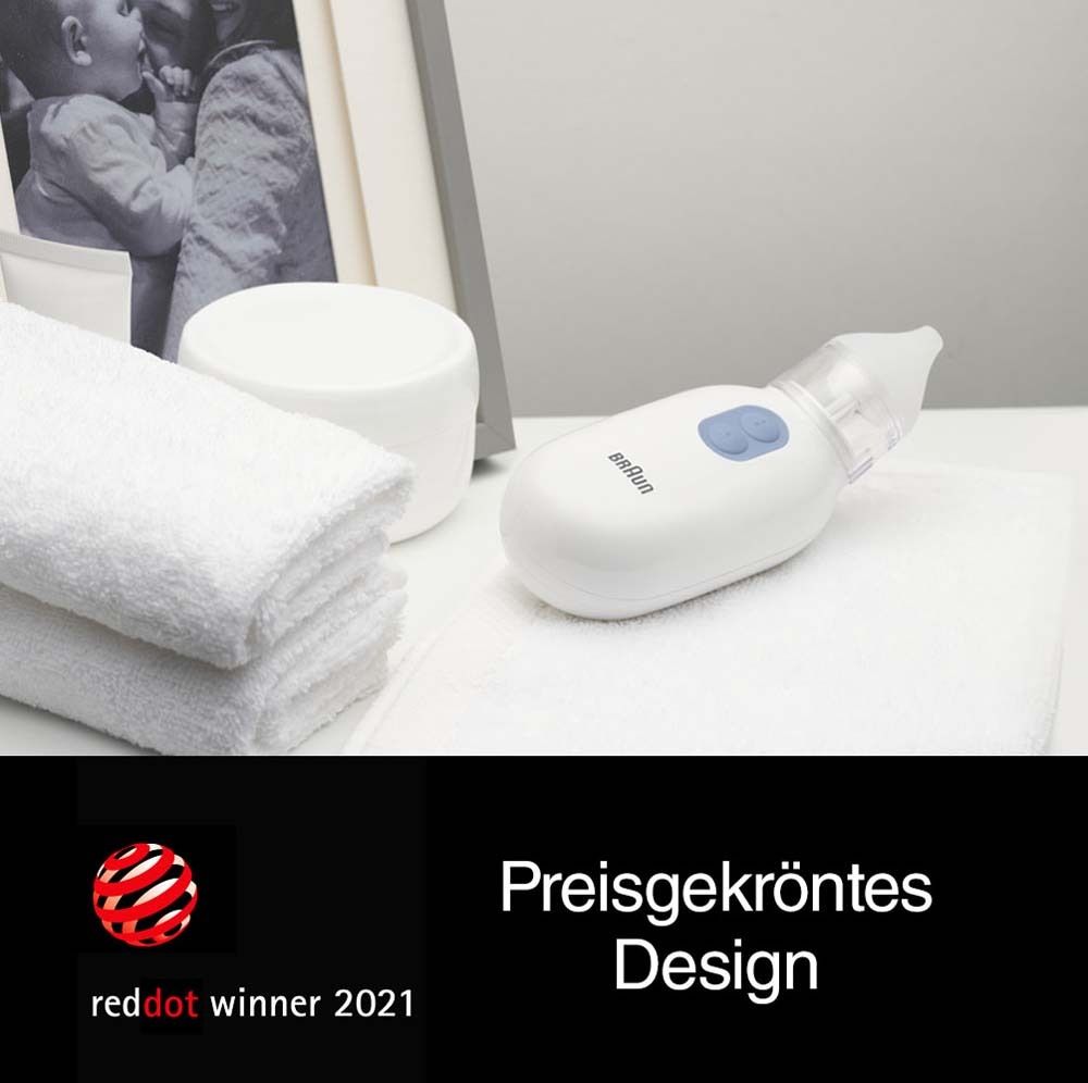 Aspirateur nasal sur serviette blanche. Prix Red Dot. Texte : Design primé.