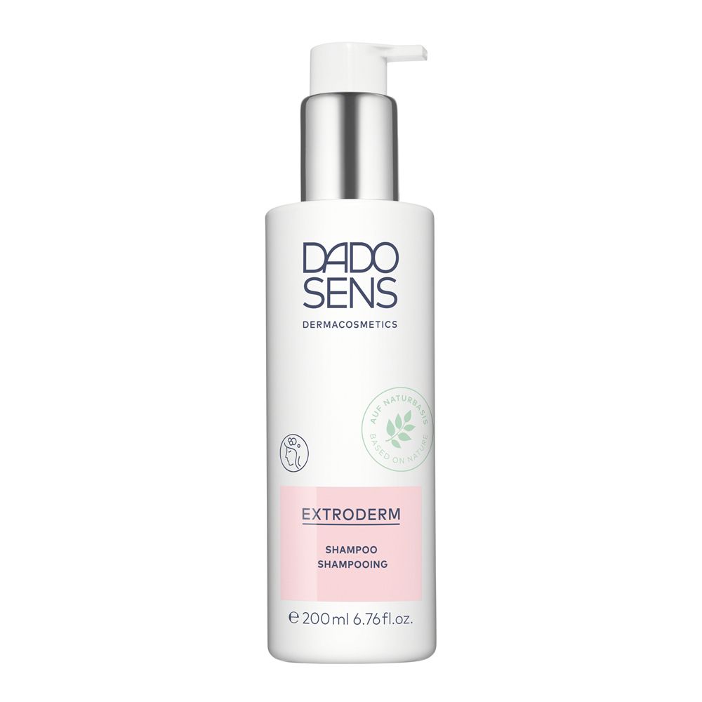 DADO SENS EXTRODERM Shampoo. Flacon blanc avec pompe, étiquette rose, feuilles vertes. 200ml.