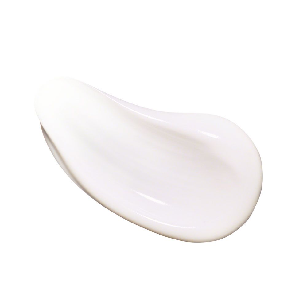 Tache de crème blanche. Lisse, brillante.