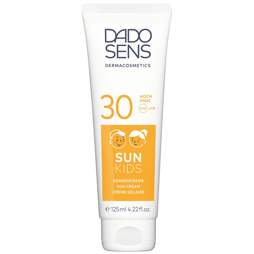 Tube de crème solaire DADO SENS SUN KIDS 30. Tube blanc avec étiquette jaune. Contient un facteur de protection solaire 30. Pour enfants.
