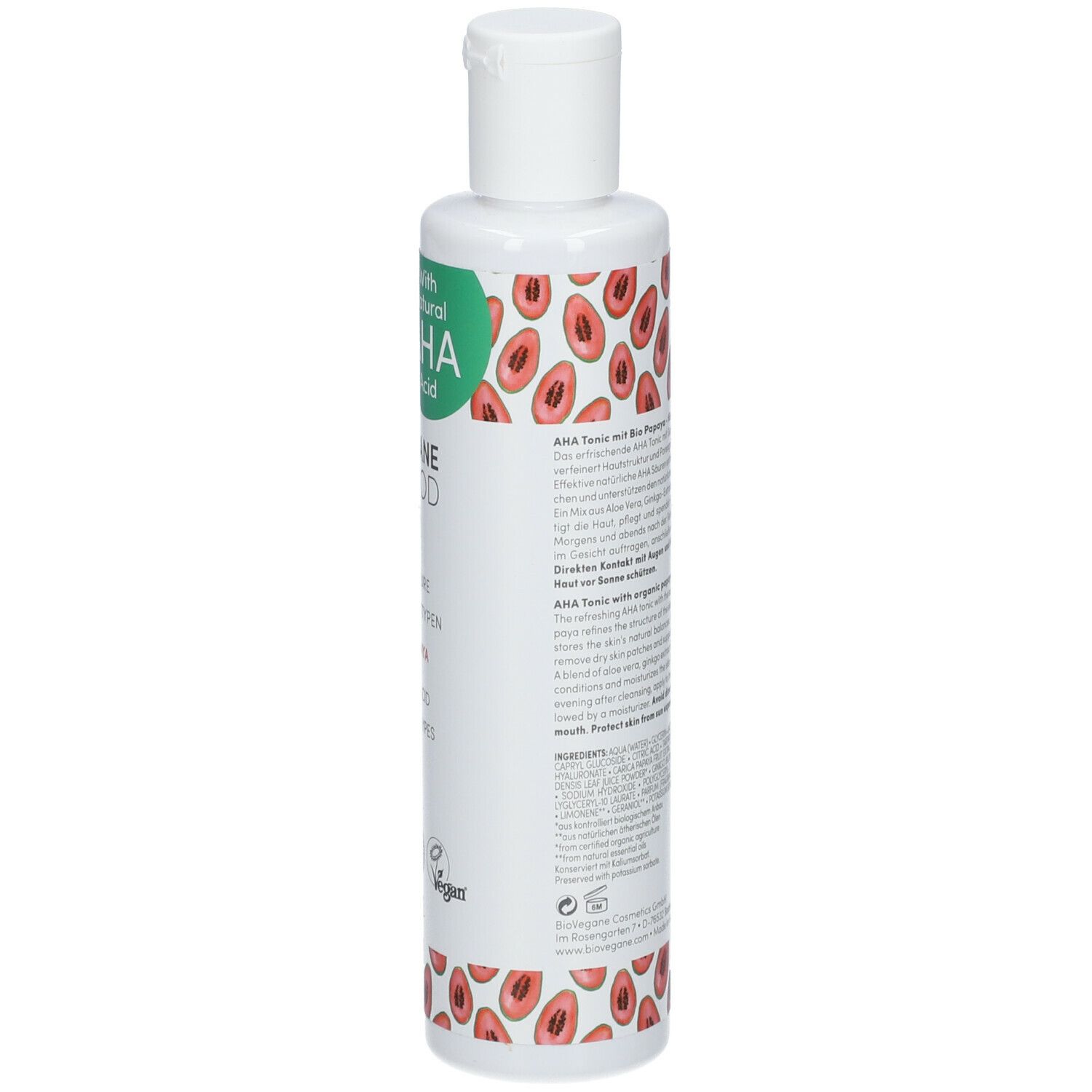Côté d'une bouteille blanche à motif papaye. Contient des informations produit et des sceaux.