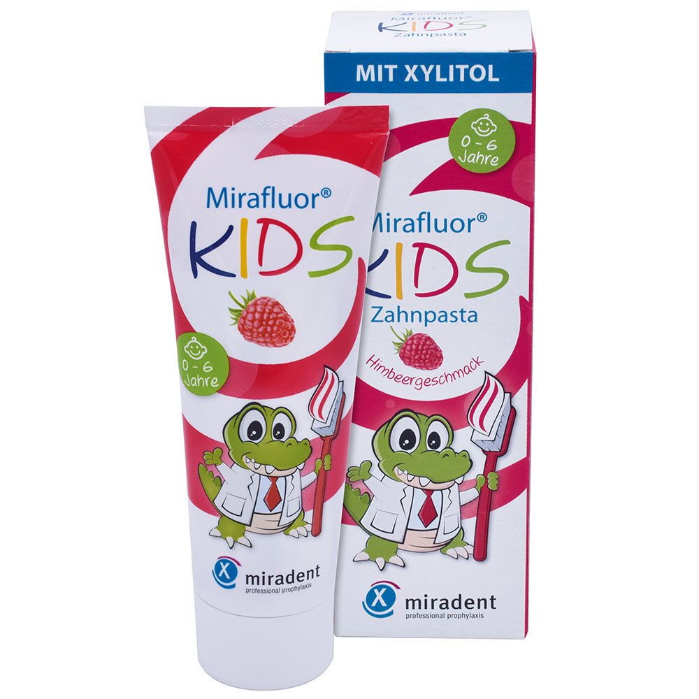 Tube et emballage de dentifrice Mirafluor KIDS. Motif : crocodile avec brosse à dents et framboise.