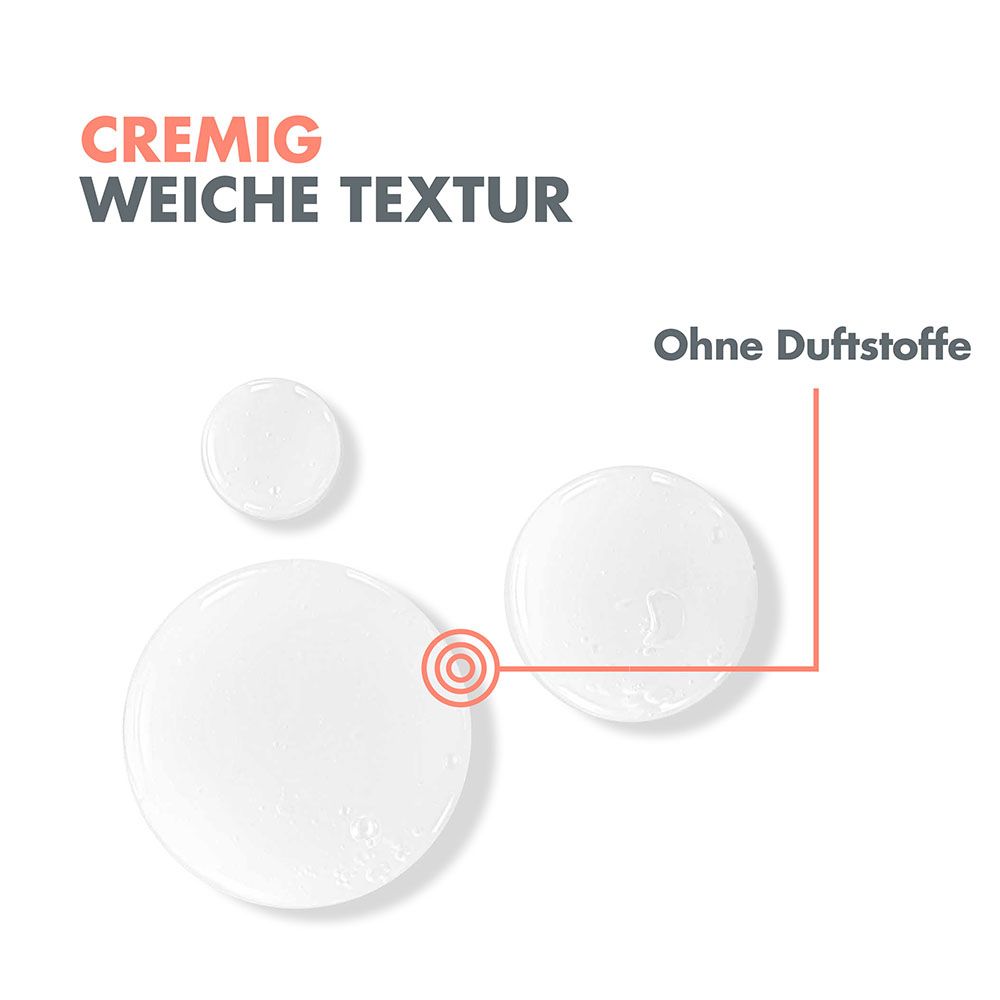 Trois gouttes d'un liquide clair et crémeux sur fond blanc. L'une montre une cible. "Texture crémeuse et douce" et "Sans parfum" sont inscrits.