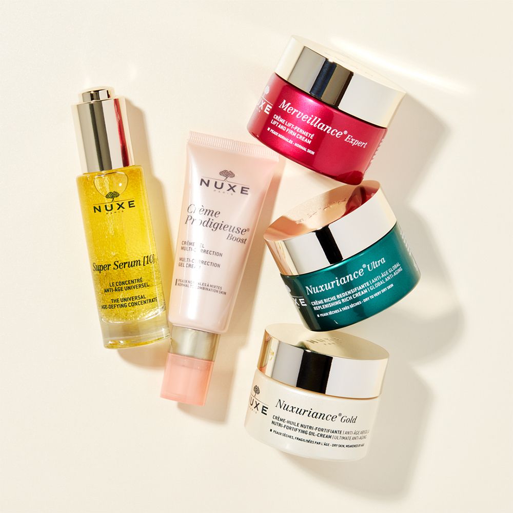 Verschillende NUXE-producten. Opschriften: Super Serum [10], Crème Prodigieuse Boost.