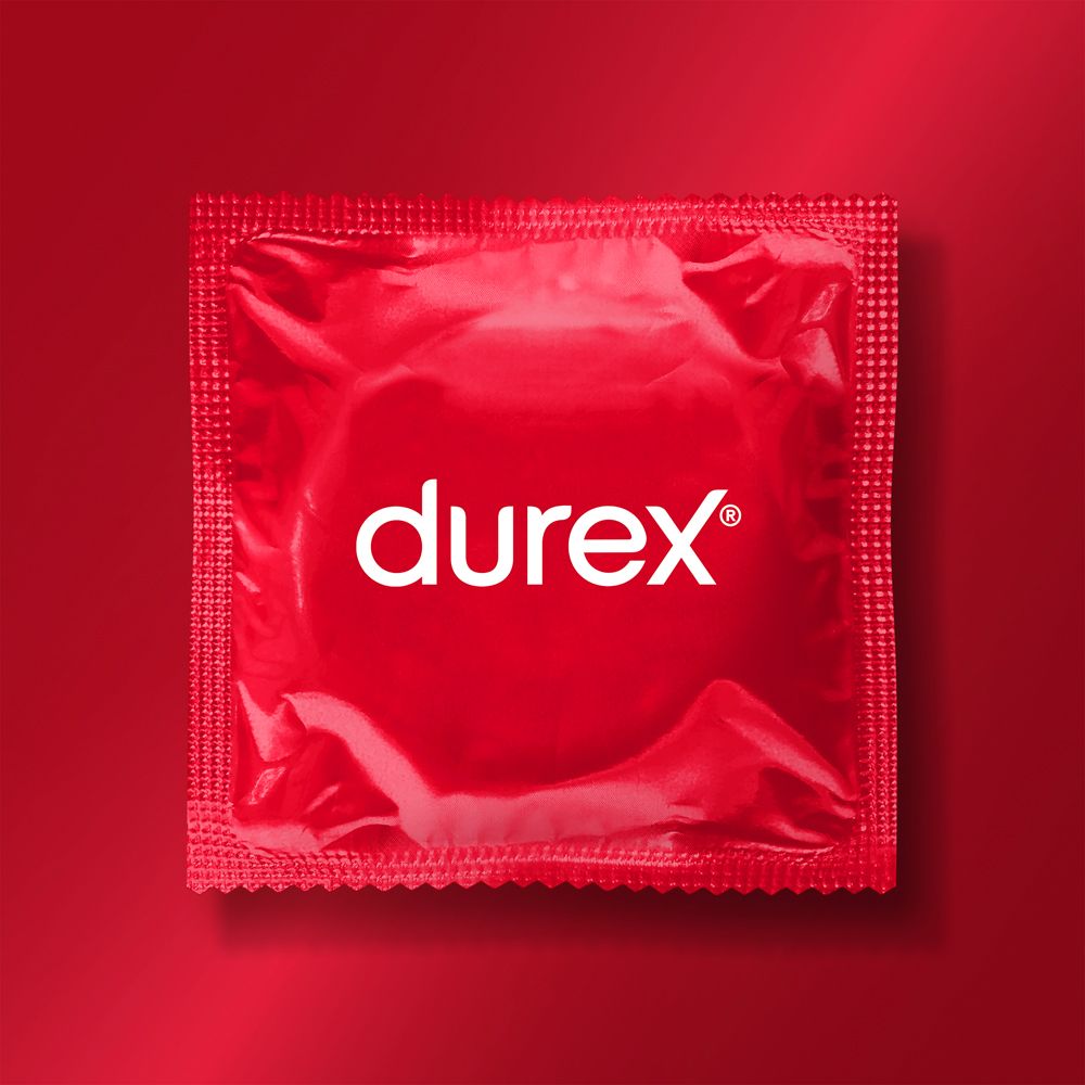 Emballage rouge de préservatif Durex avec logo blanc.