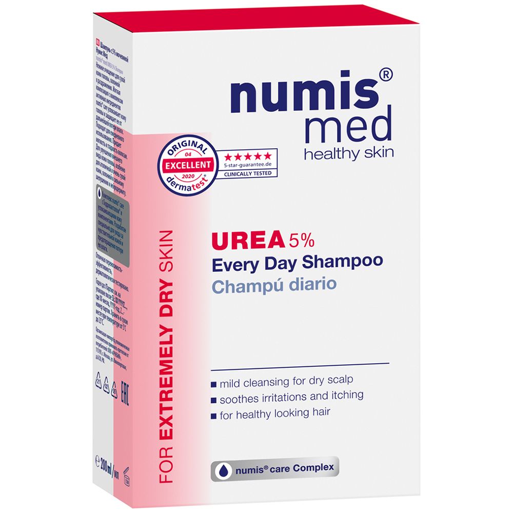 Boîte blanche avec texte rouge et rose. Inscription : numis med UREA 5% Everyday Shampoo. Pour peaux très sèches. Testé dermatologiquement.