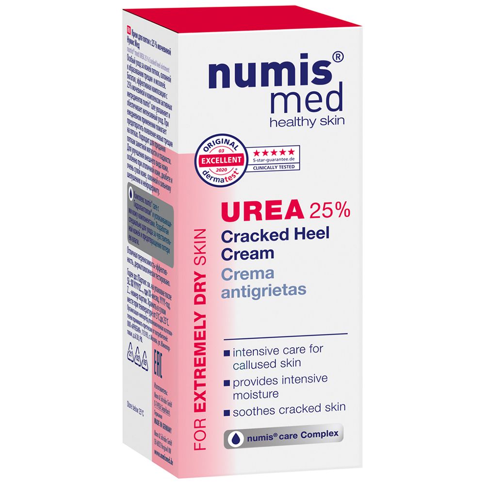 Emballage en carton. Inscription : numis med UREA 25% Cracked Heel Cream. Label Dermatest. Texte en allemand et anglais.