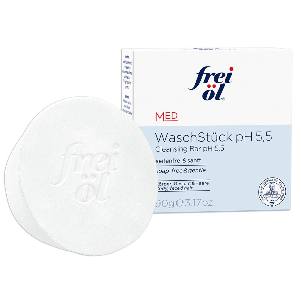 Pain lavant blanc rond avec gaufrage « frei öl » et emballage. Inscription : WaschStück pH 5,5, nettoyage 3-en-1 sans savon.