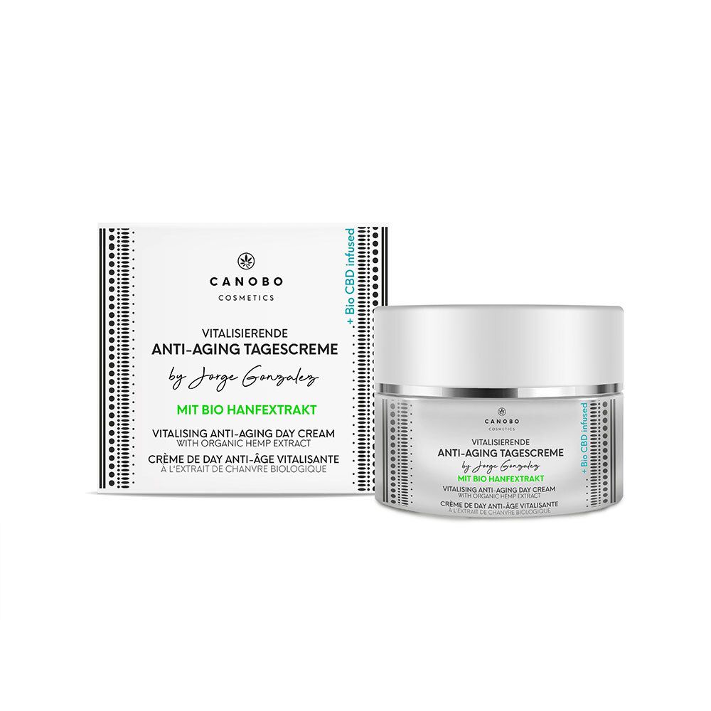 Pot de crème et emballage. Inscription : CANOBO Cosmetics, Crème de jour anti-âge, avec extrait de chanvre bio. Emballage blanc avec motif noir.