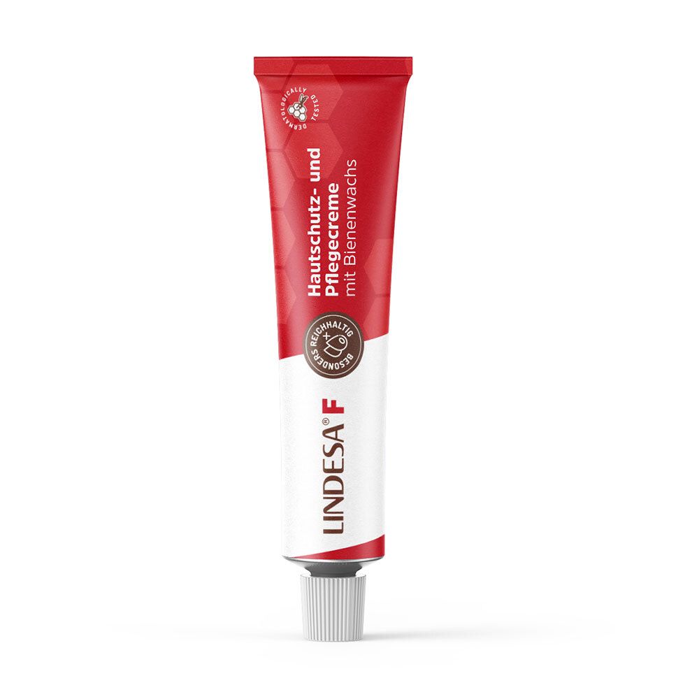 Tube rouge avec texte blanc. LINDESA® F, crème protectrice et soin avec cire d'abeille. Sceau.