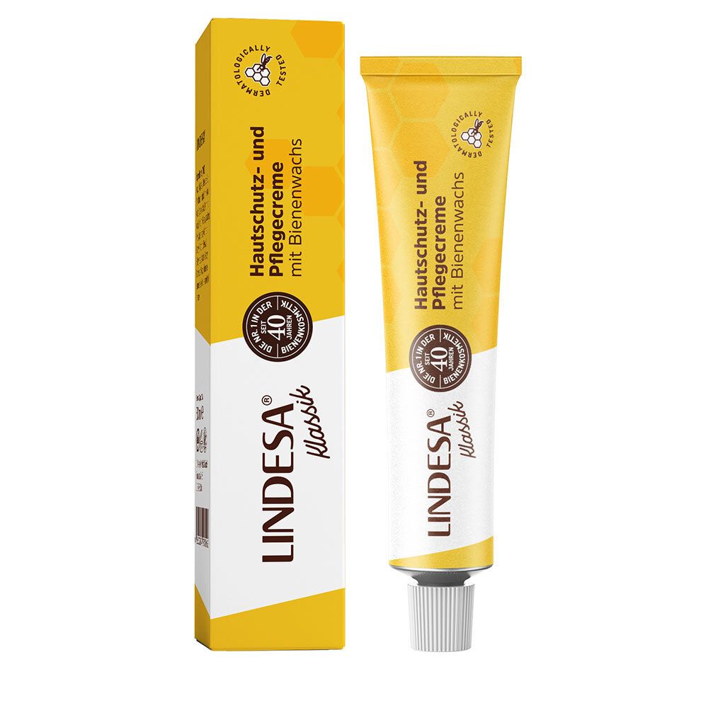 Tube et emballage. Inscription: Crème protectrice et soin avec cire d'abeille. Logo: LINDESA® Klassik. Jaune et blanc.
