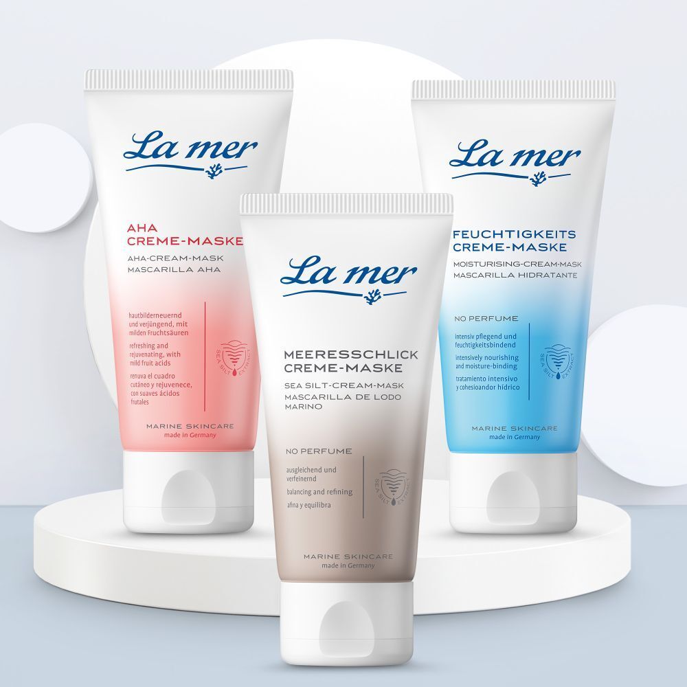 Trois tubes de produit. Texte : La mer. AHA Creme-Maske, Meeresschlick Creme-Maske, Feuchtigkeitscreme-Maske.