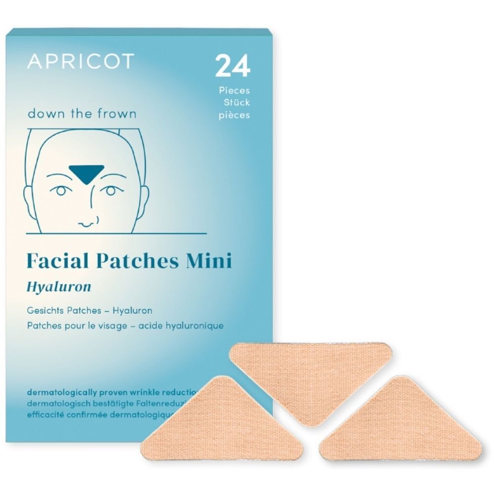 Lichtblauwe doos met productnaam en 24 patches. Drie driehoekige patches ernaast.