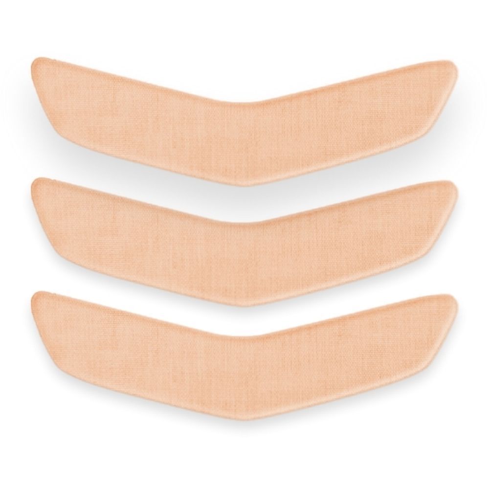 Drie beige mondpatches, V-vormig. Op lichte achtergrond.