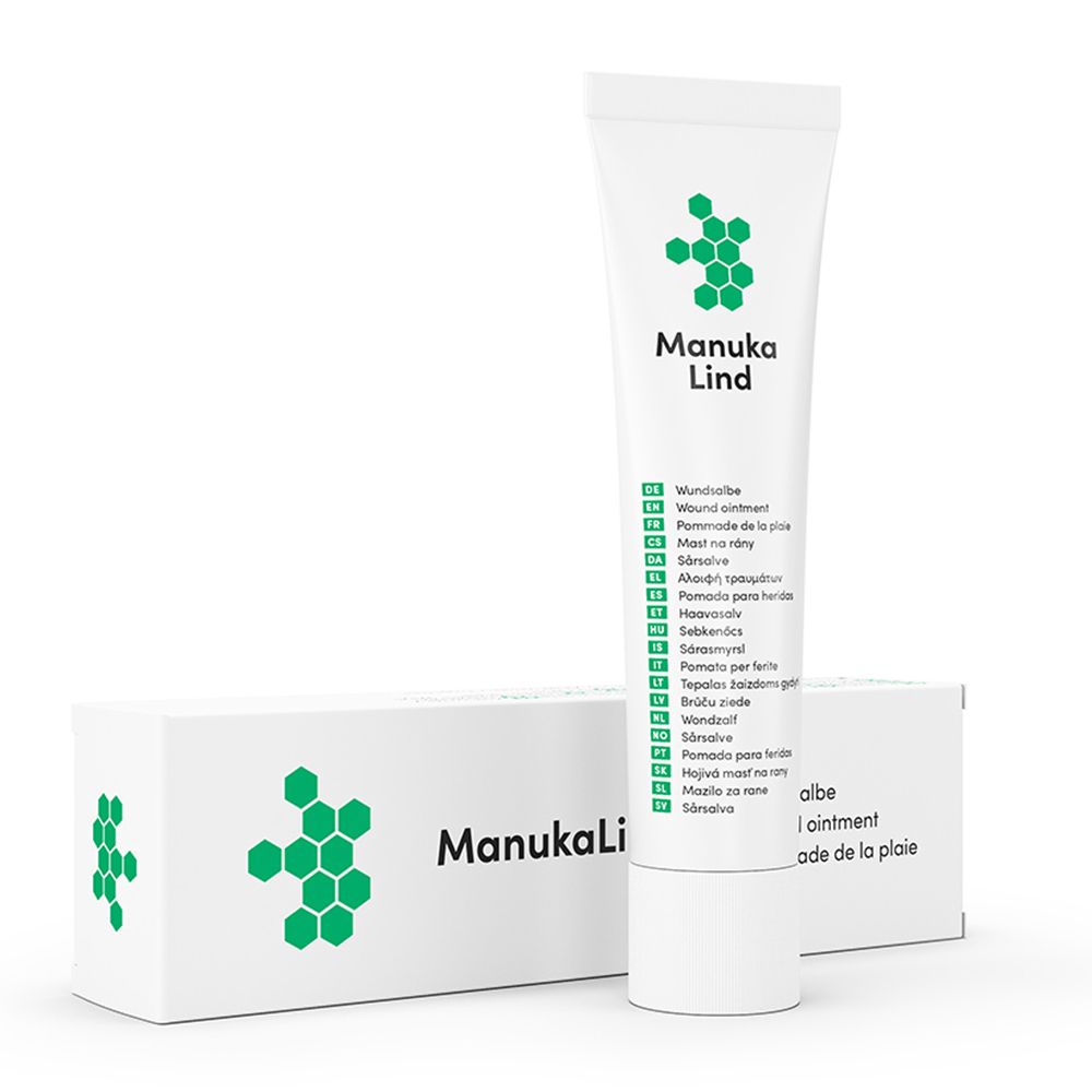 Tube en doos ManukaLind. Groen-wit ontwerp. Opschrift: Wondzalf.