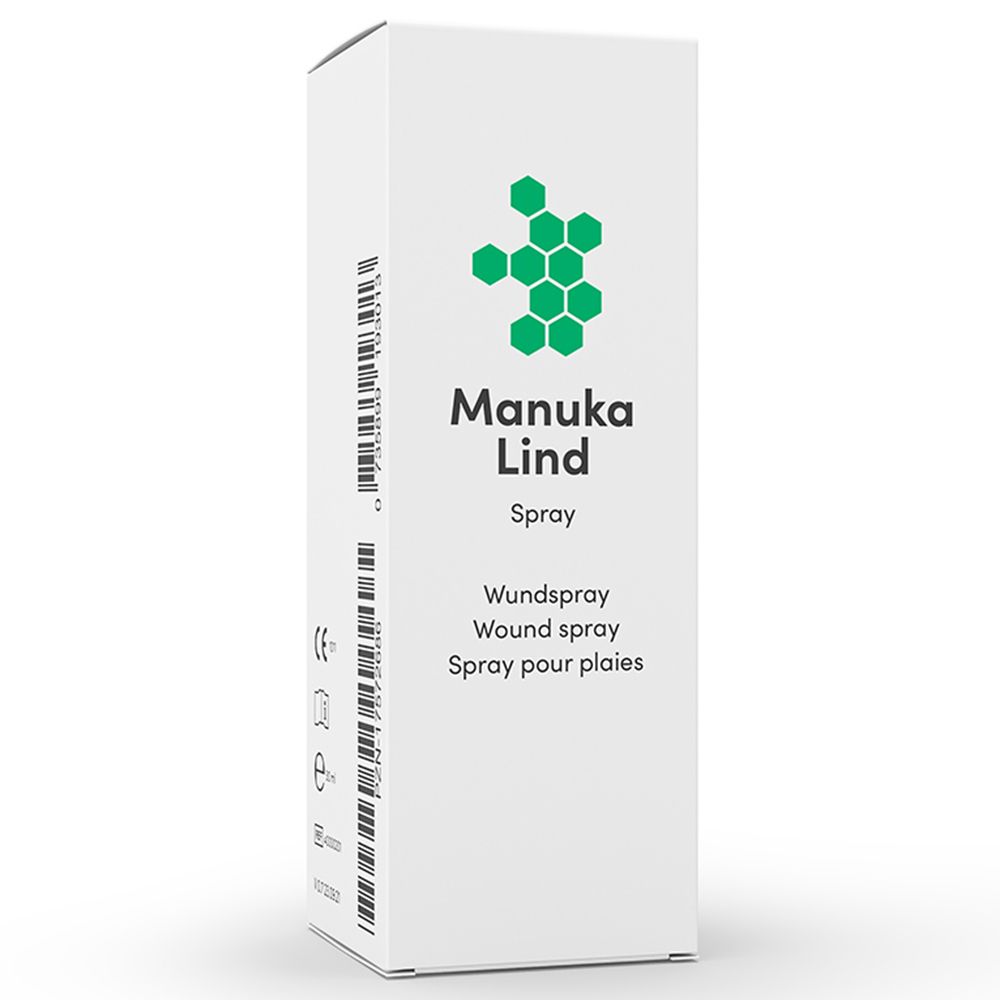 Doos met groen logo en tekst Manuka Lind Spray. Tekst: Wundspray, Wound spray, Spray pour plaies. Witte achtergrond.
