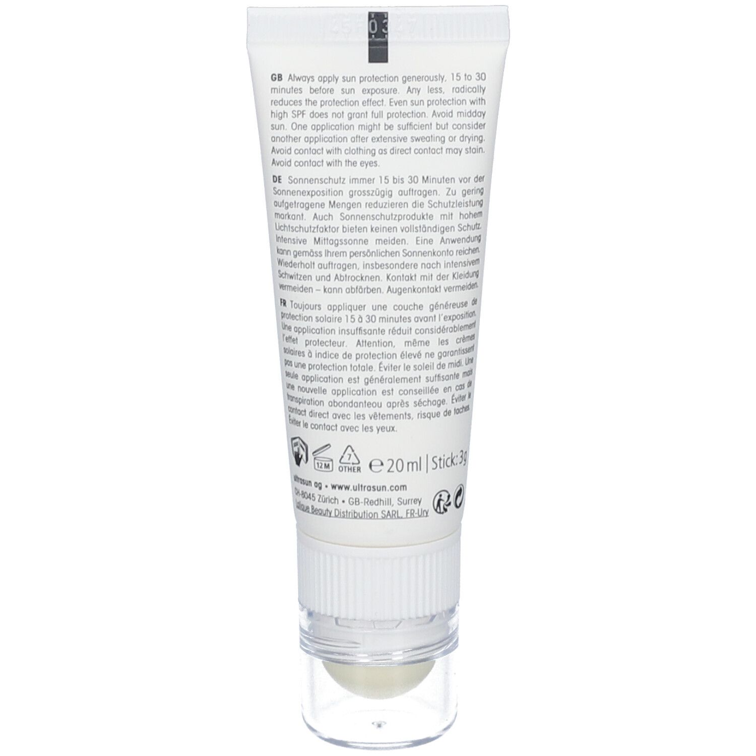 Achterkant van de zonnecrèmetube. Meertalige tekst. Merk: ultrasun. E20ml | Stick 3g.