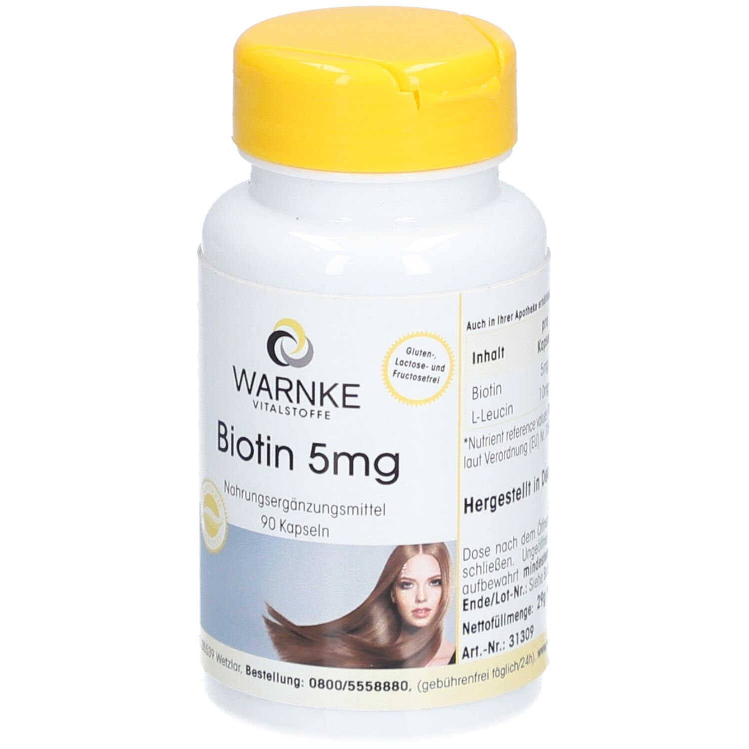 Flacon blanc à bouchon jaune. Inscription: Warnke Vitalstoffe, Biotin 5mg, 90 gélules. Image d'une femme aux cheveux longs.