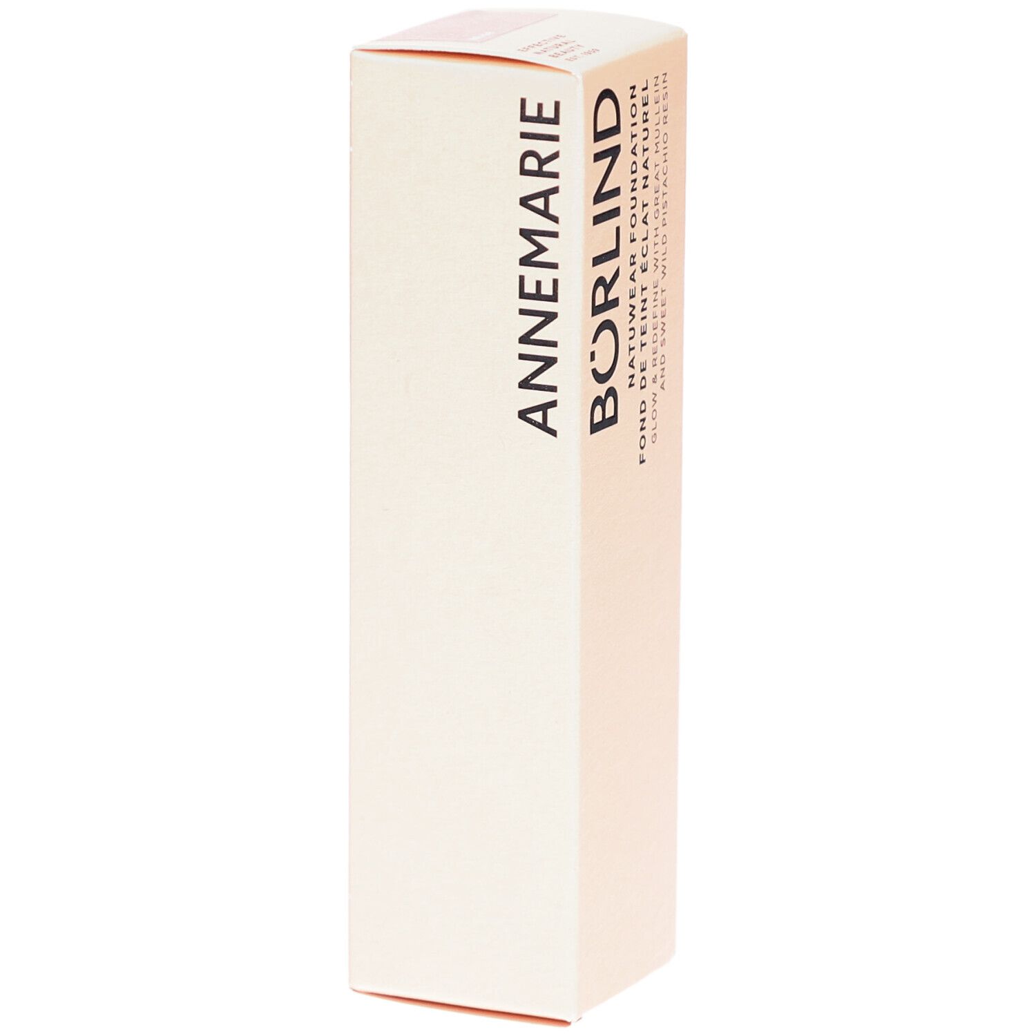 Make-up verpakking met opschrift: ANNEMARIE BÖRLIND. Beige tint. Opdruk: NATUWEAR FOUNDATION.