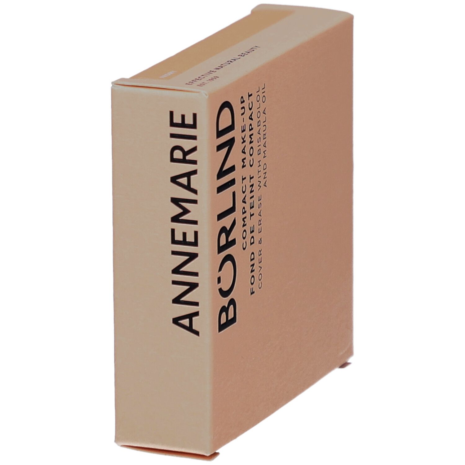 Vue oblique de l'emballage de maquillage. Texte: ANNEMARIE BÖRLIND, COMPACT MAKE-UP, FOND DE TEINT COMPACT, COVER & ERASE WITH BISABOLOL AND MARULA OIL.