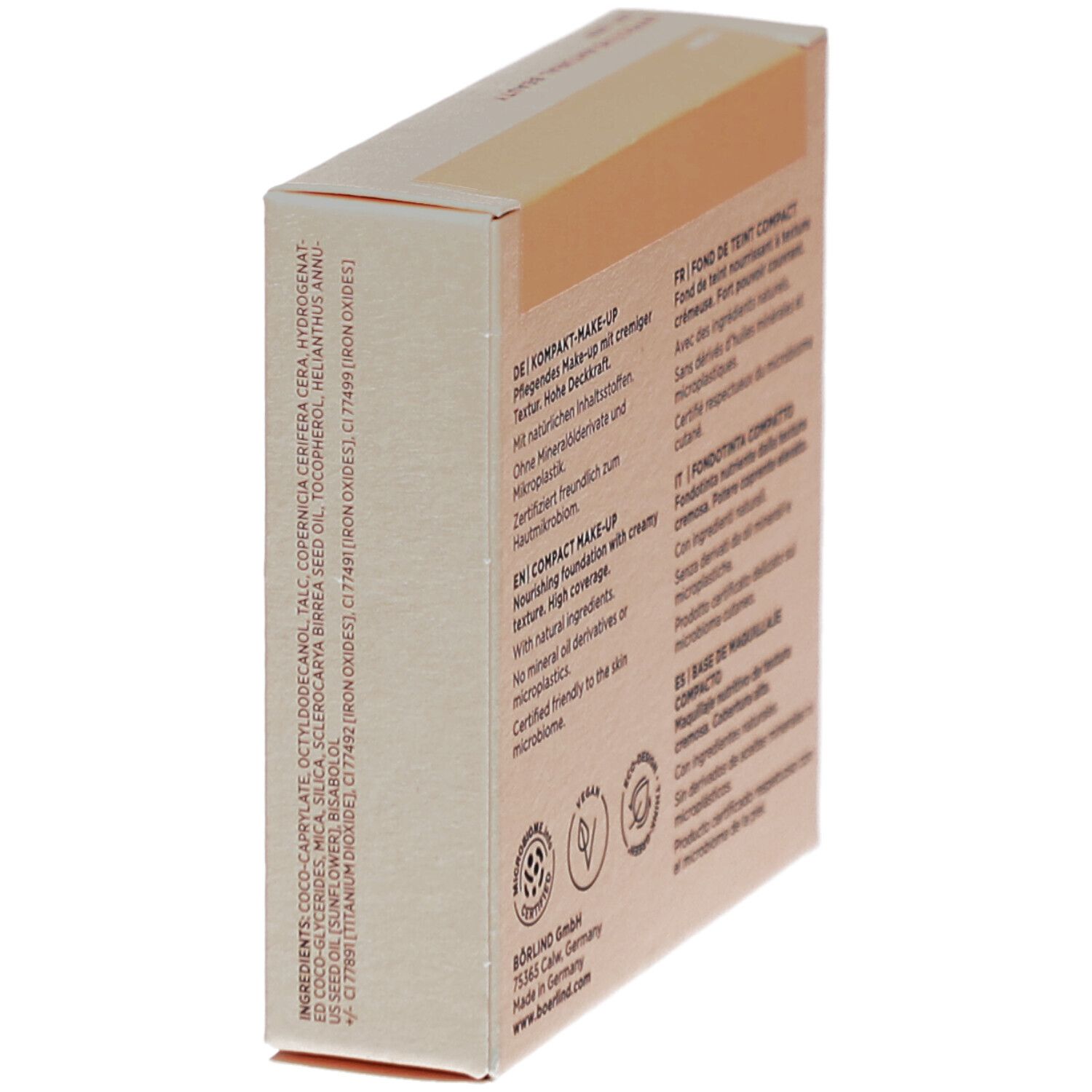 Vue oblique de l'emballage de maquillage. Texte: ingrédients, BÖRLIND GmbH, Made in Germany. Logos: certification microbienne, Vegan, Eco-Design.