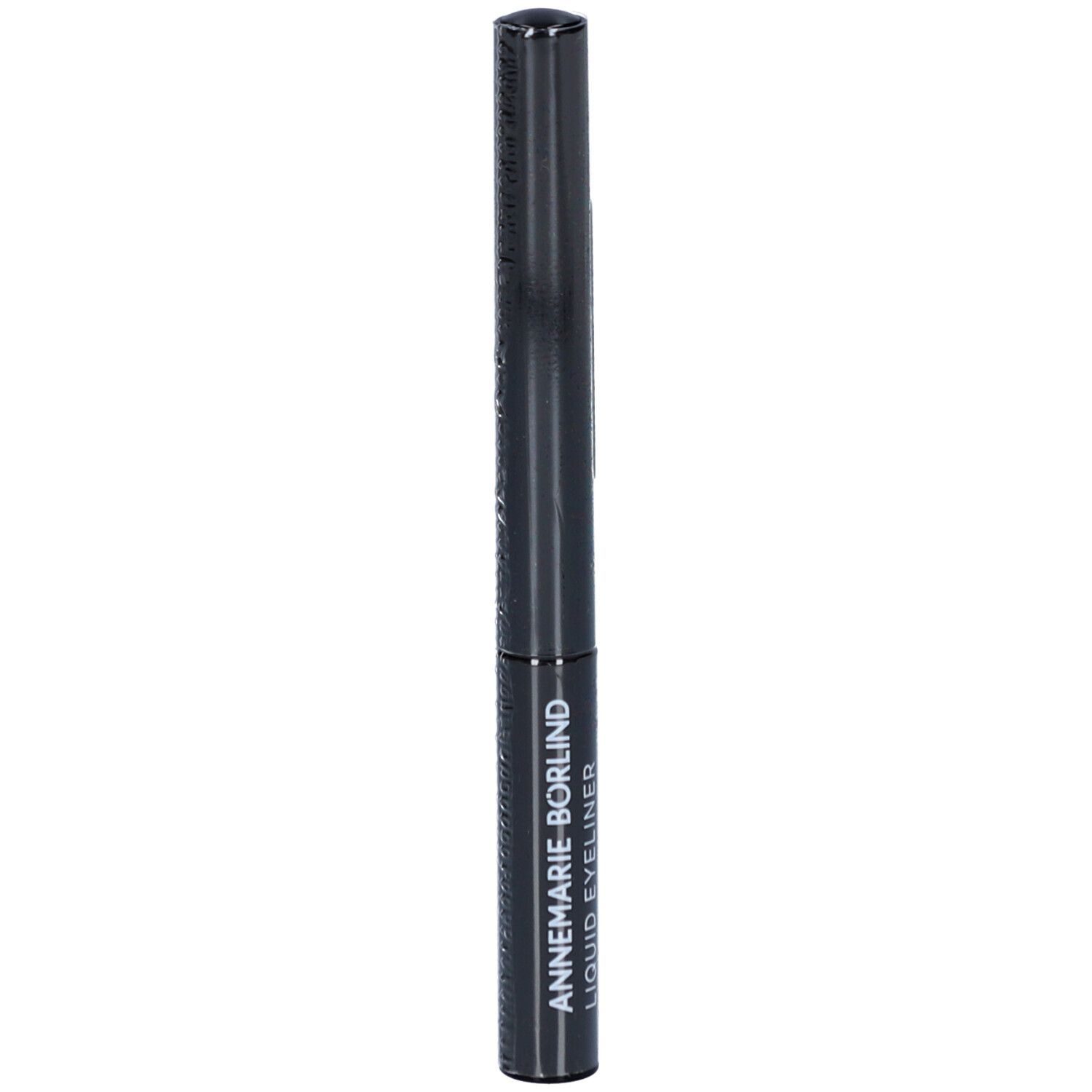 Eyeliner liquide noir dans un étui cylindrique. L'étui porte l'inscription blanche : ANNEMARIE BÖRLIND LIQUID-EYELINER. Orientation verticale.