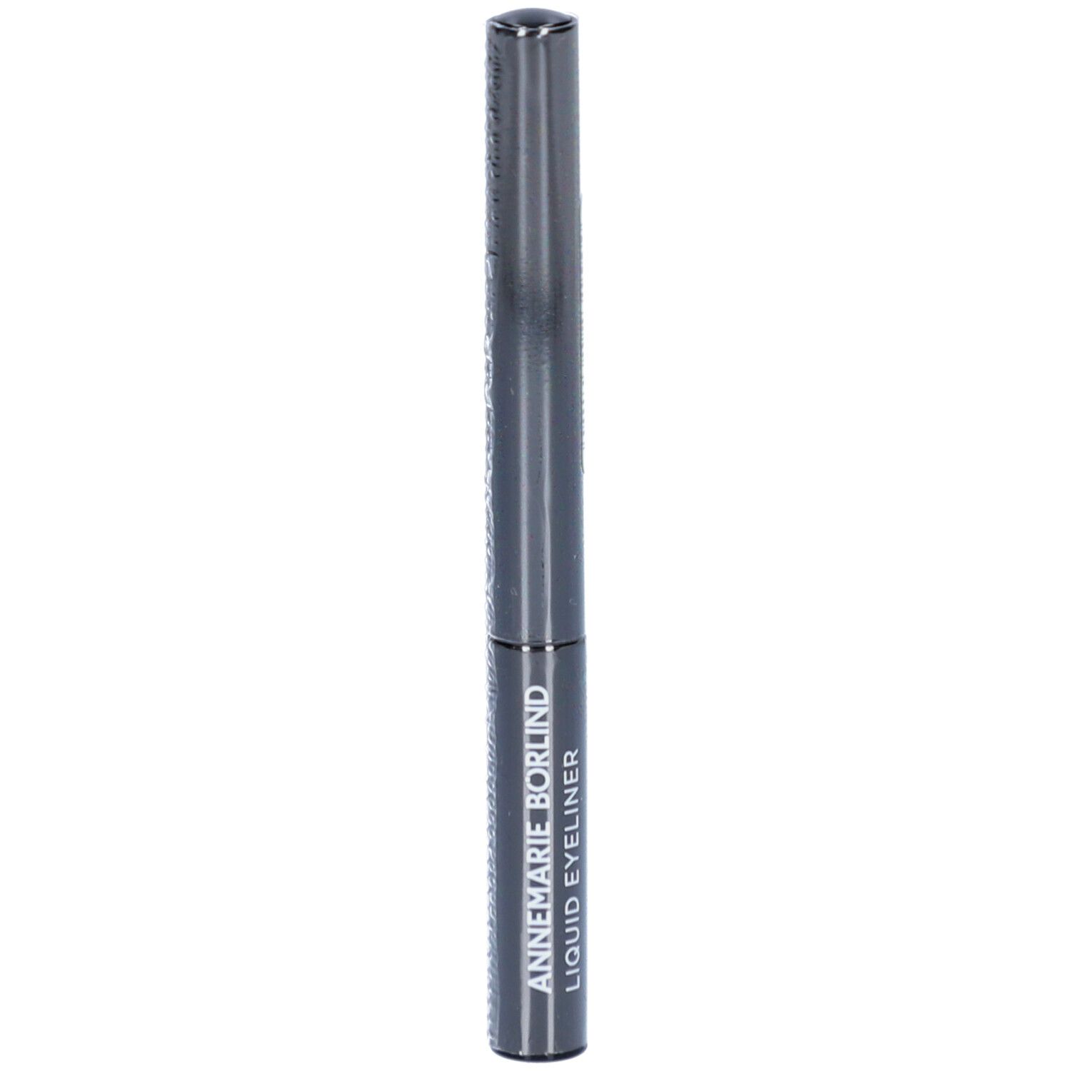 Eyeliner liquide noir dans un étui cylindrique. L'étui porte l'inscription blanche : ANNEMARIE BÖRLIND LIQUID-EYELINER. Orientation verticale.