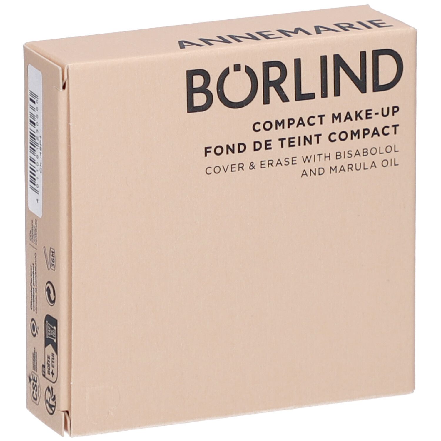 Compacte make-up verpakking. Merk: Annemarie Börlind. Tekst: Compact Make-up, Cover & Erase. Beige karton.