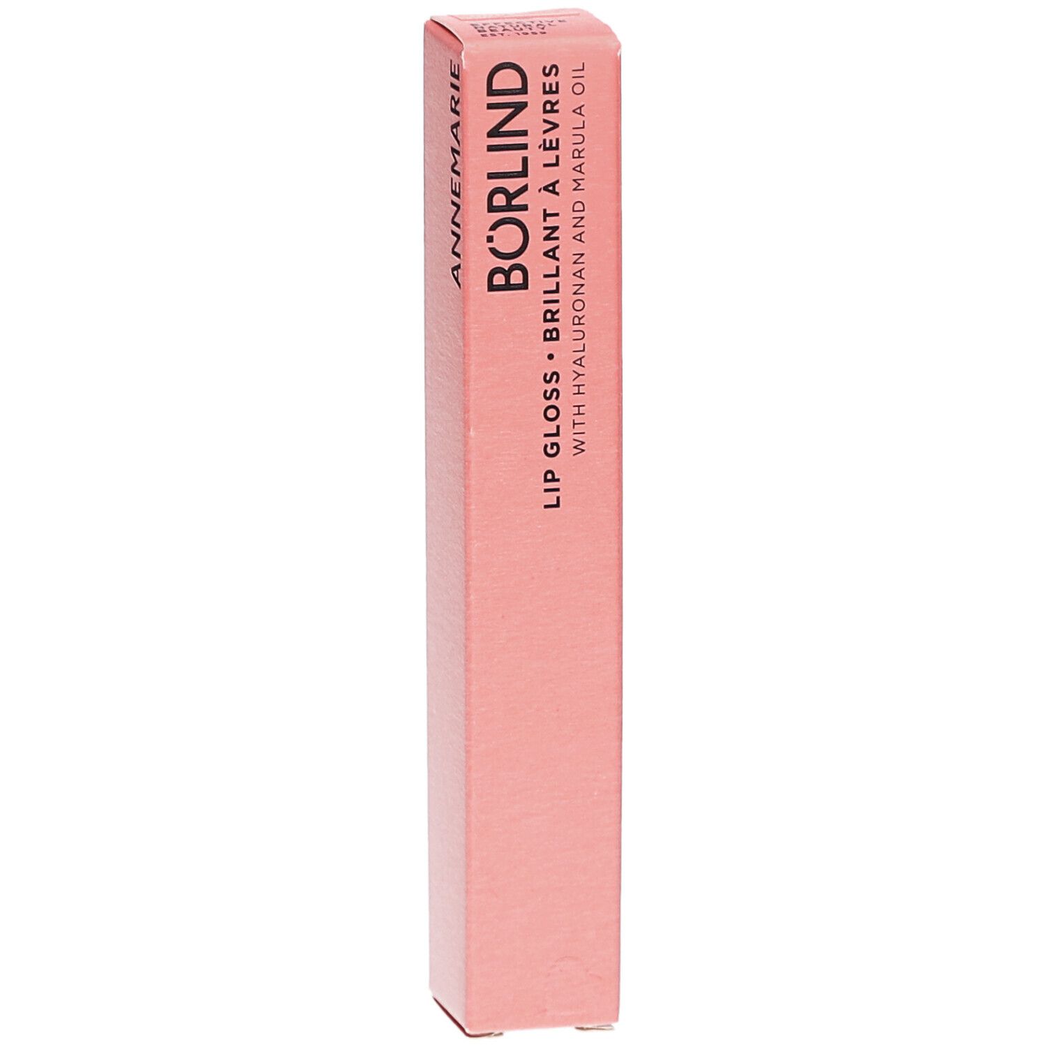 Emballage rose de Lipgloss ANNEMARIE BÖRLIND. Texte: LIP GLOSS, BRILLANT À LÈVRES, WITH HYALURONAN AND MARULA OIL.