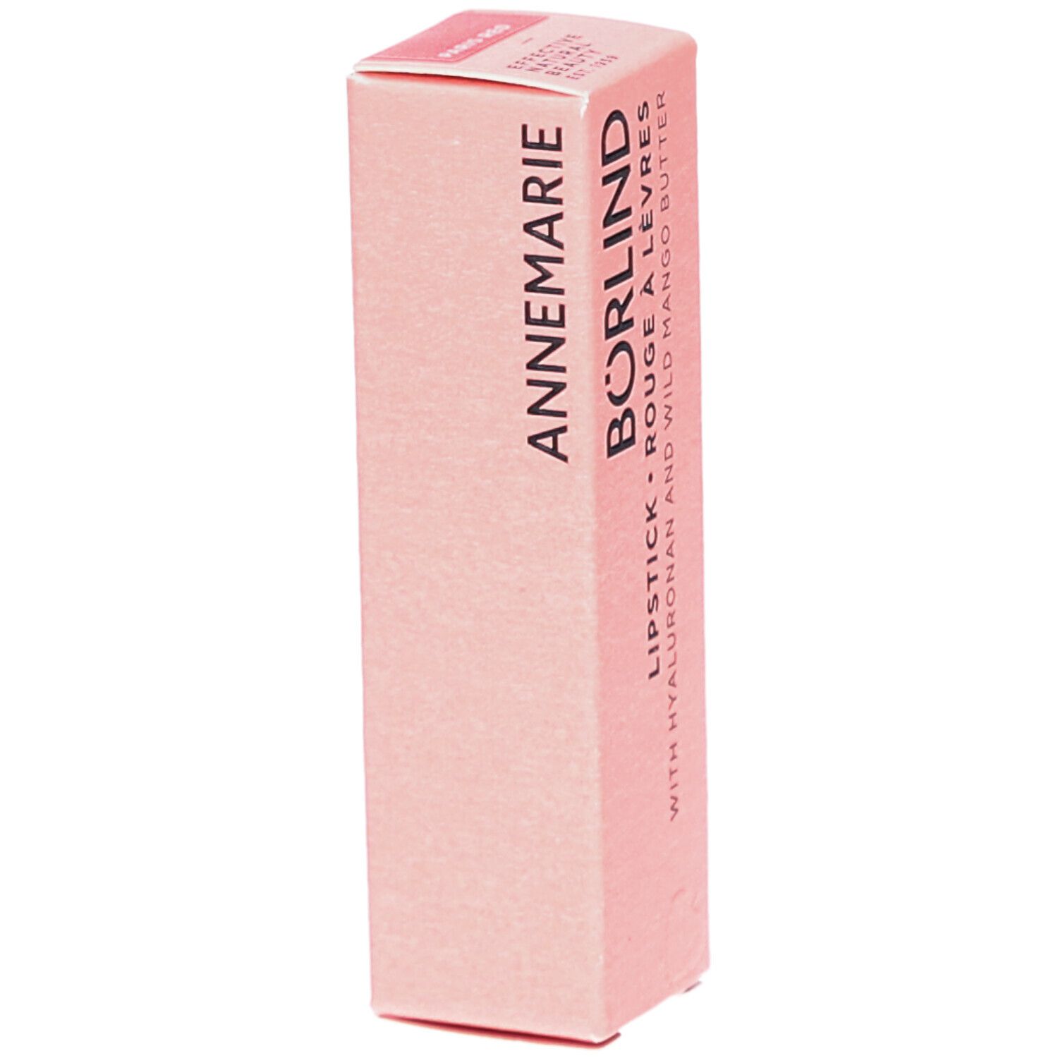 Roze kartonnen verpakking. Opschrift: ANNEMARIE BÖRLIND, Lipstick Rouge à Lèvres, met Hyaluron en Wilde Mangoboter. Schuine weergave.