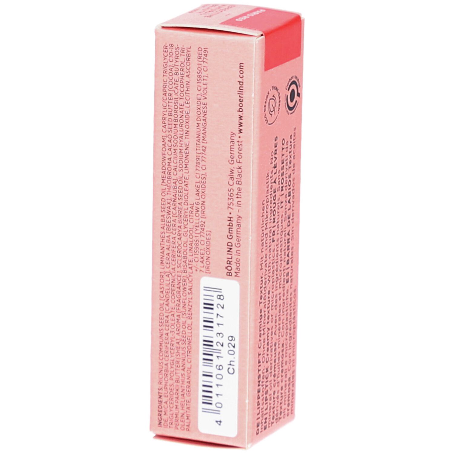 Achterkant van de roze kartonnen verpakking. Bevat ingrediënten, fabrikantinfo en batchnummer. Tekst in meerdere talen.