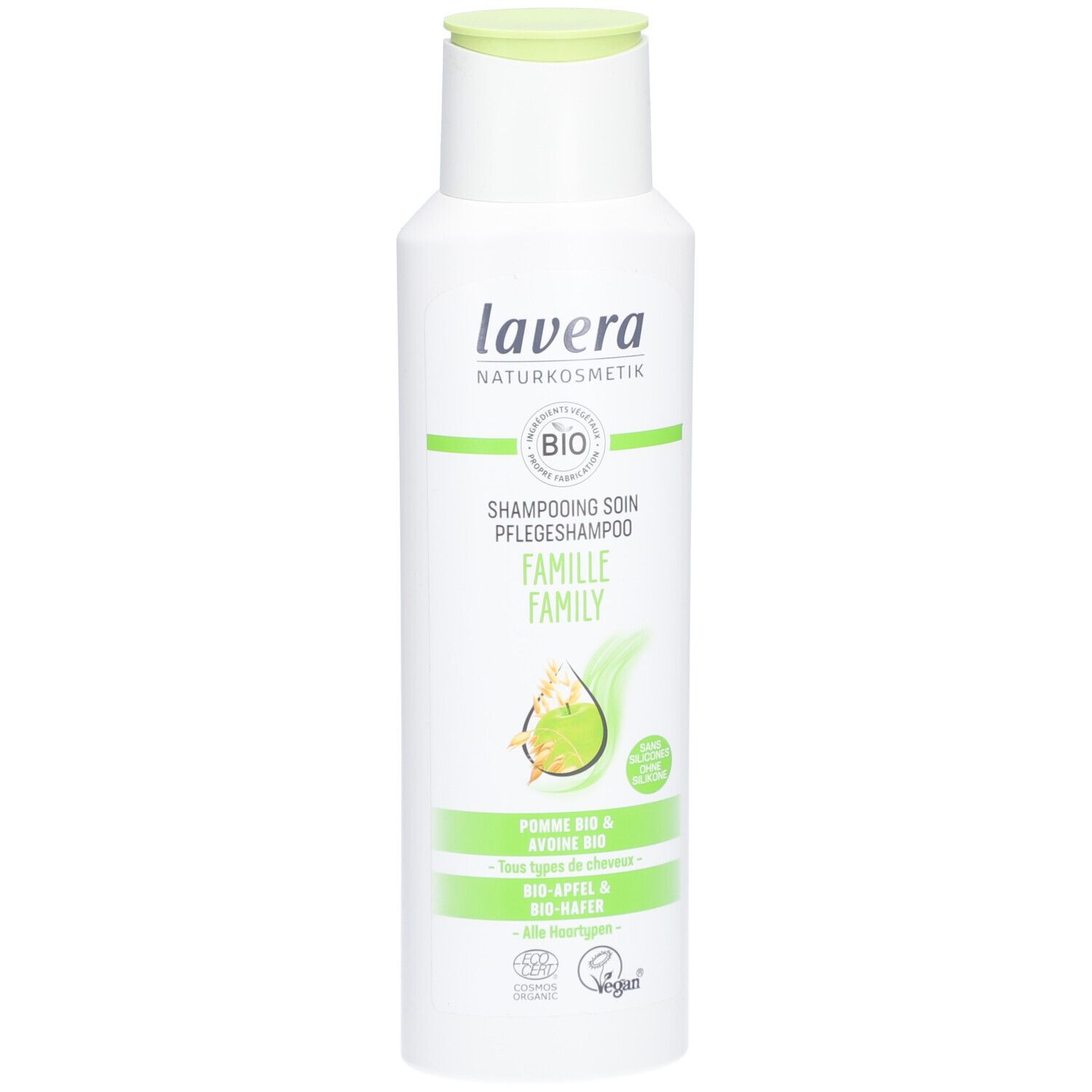 Witte fles met groene dop. Opschrift: lavera, BIO, Pflegeshampoo Familie. Afbeelding appel en haver.