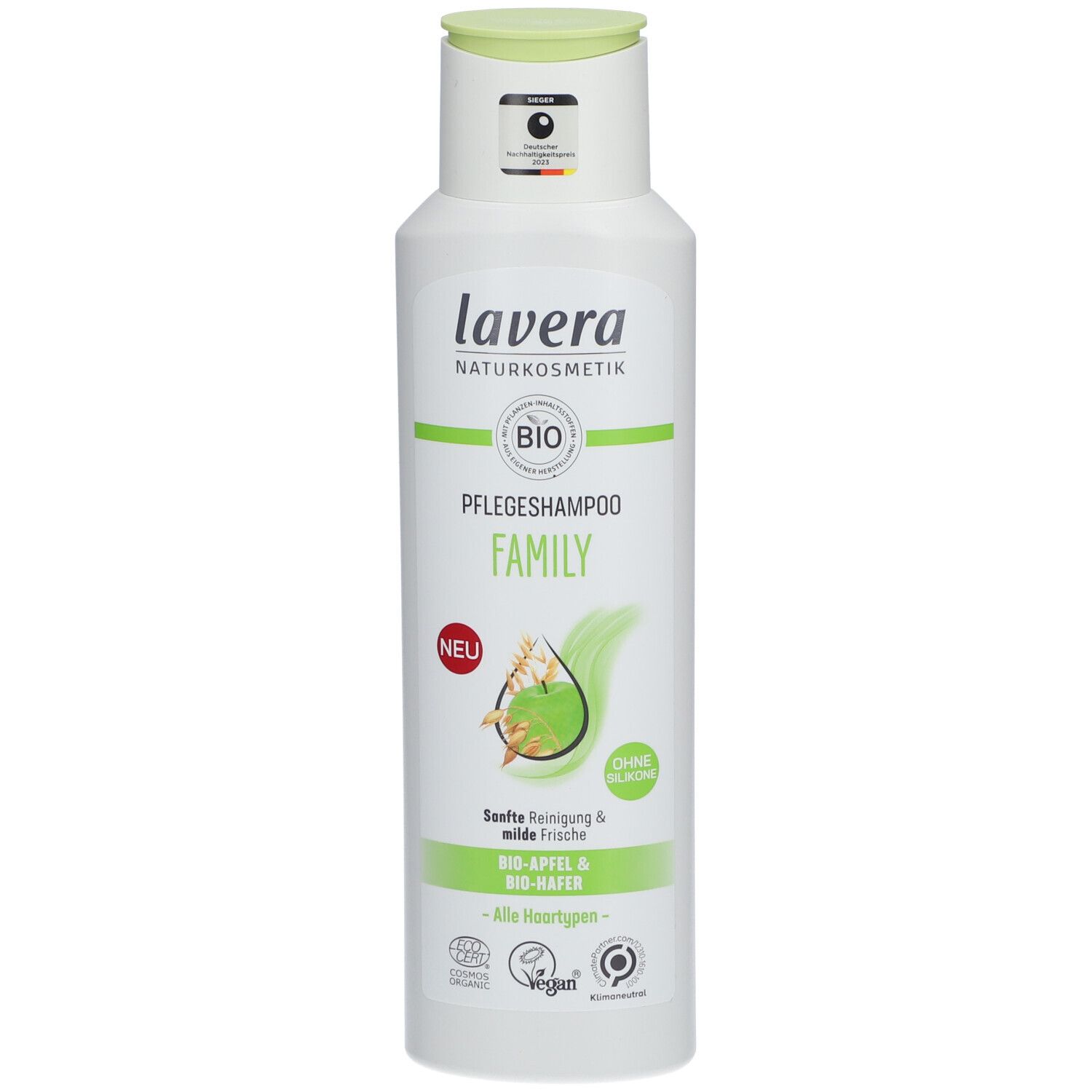 Witte fles met groene dop. Opschrift: lavera, BIO, Pflegeshampoo Familie. Afbeelding appel en haver.