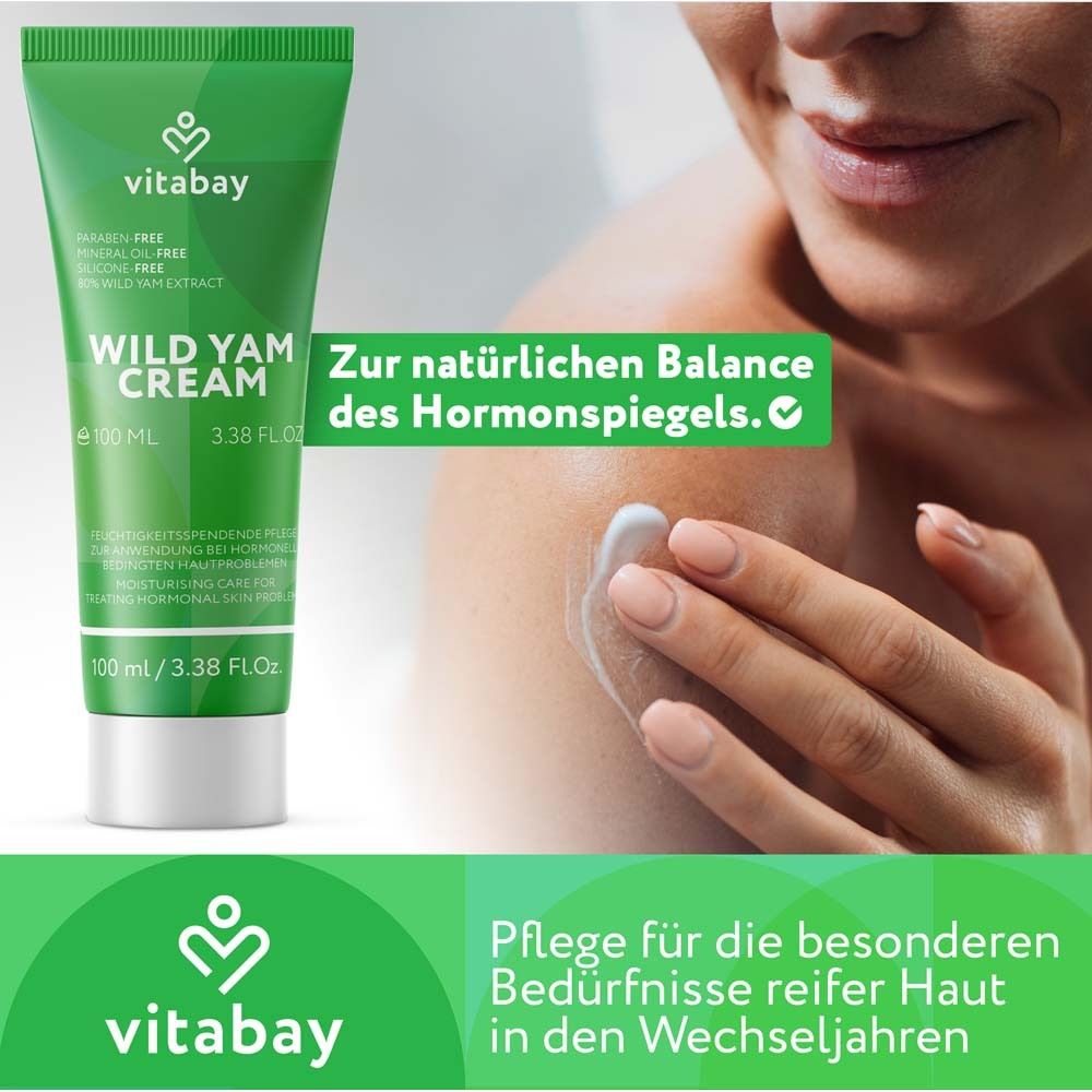 Tube vert "Wild Yam Cream" à côté d'une main appliquant la crème. Texte : "Pour l'équilibre hormonal naturel".