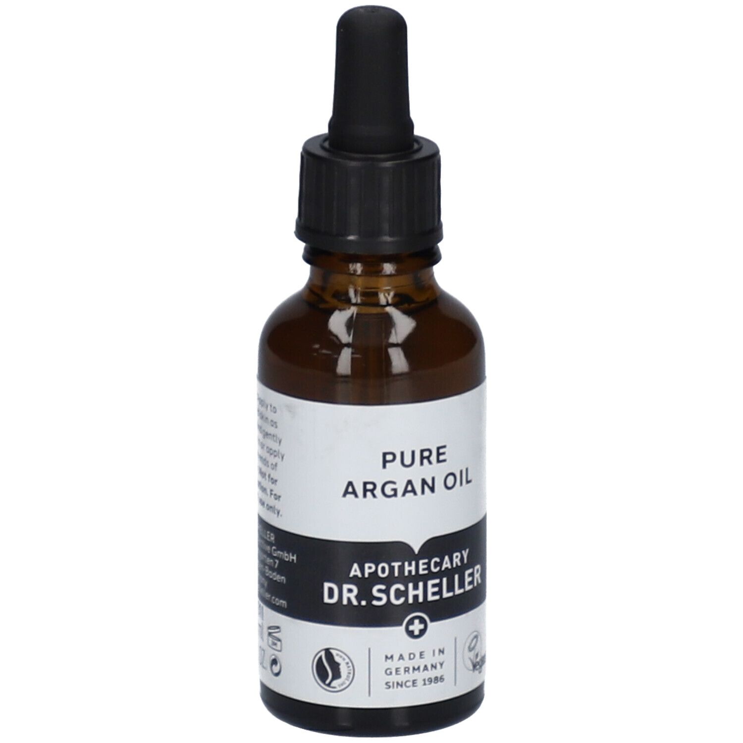 Bruine glazen fles met zwarte dop en pipet. Etiket met "PURE ARGAN OIL" en "APOTHECARY DR.SCHELLER".