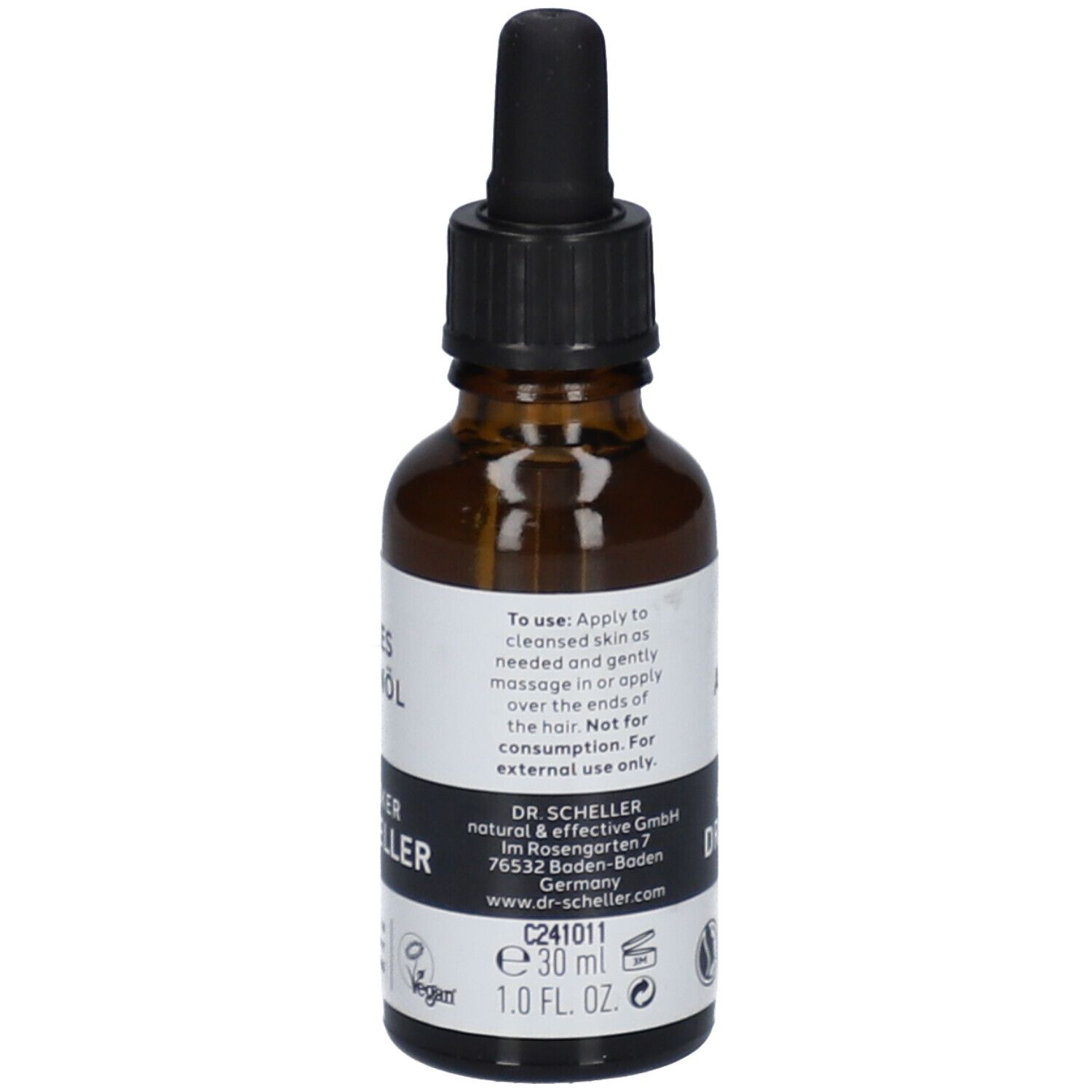 Bruine glazen fles met zwarte dop en pipet. Etiket met tekst en "DR. SCHELLER". 30 ml.