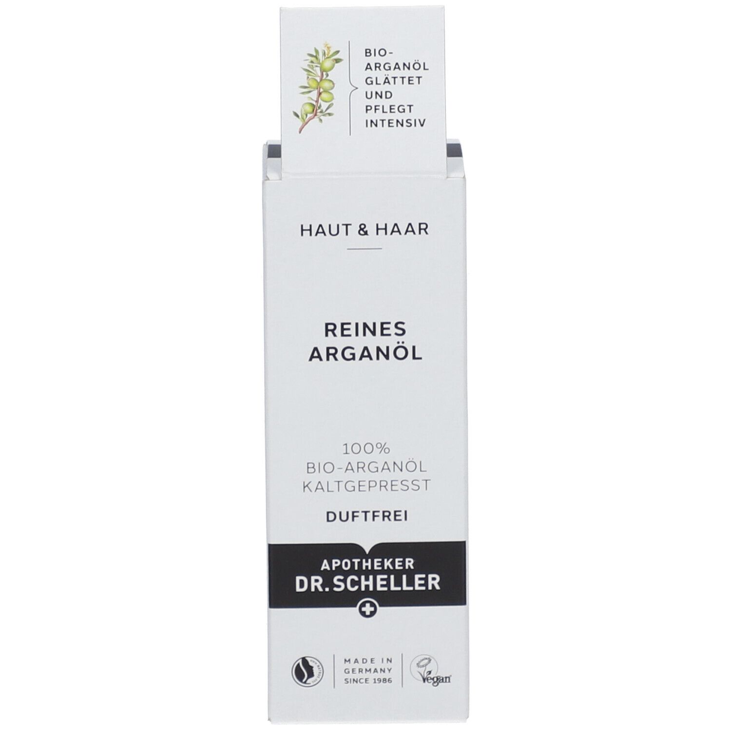Productverpakking. Doos met "HAUT & HAAR" en "REINES ARGANÖL". Afbeelding van argan tak.